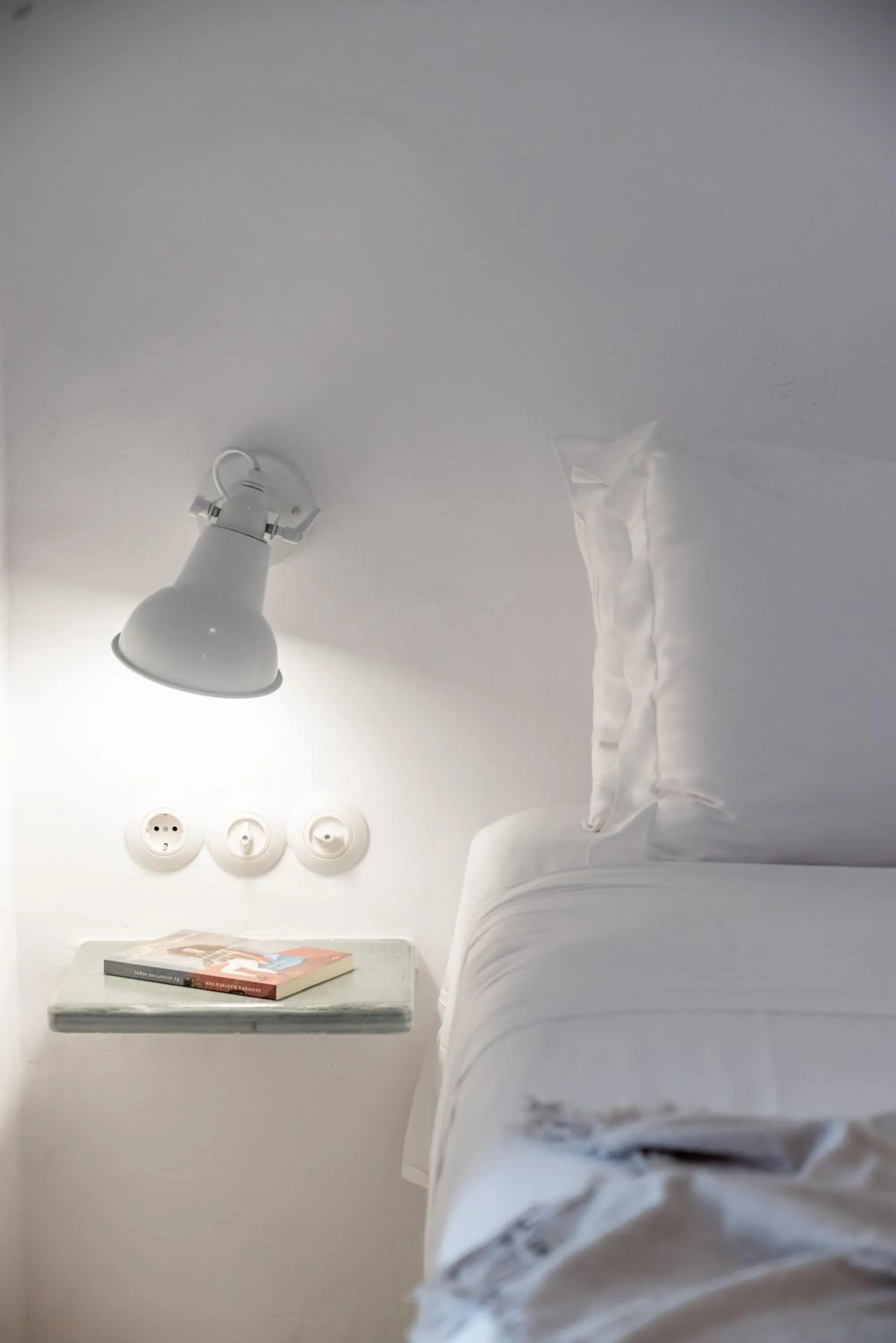 Bed in aníko suites White Alley