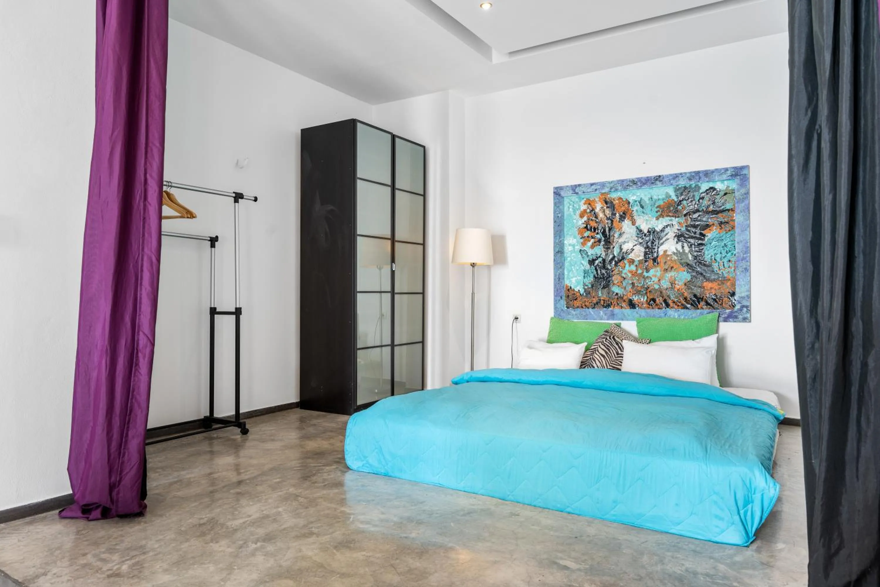 Bed in Serenity Boutique Suites