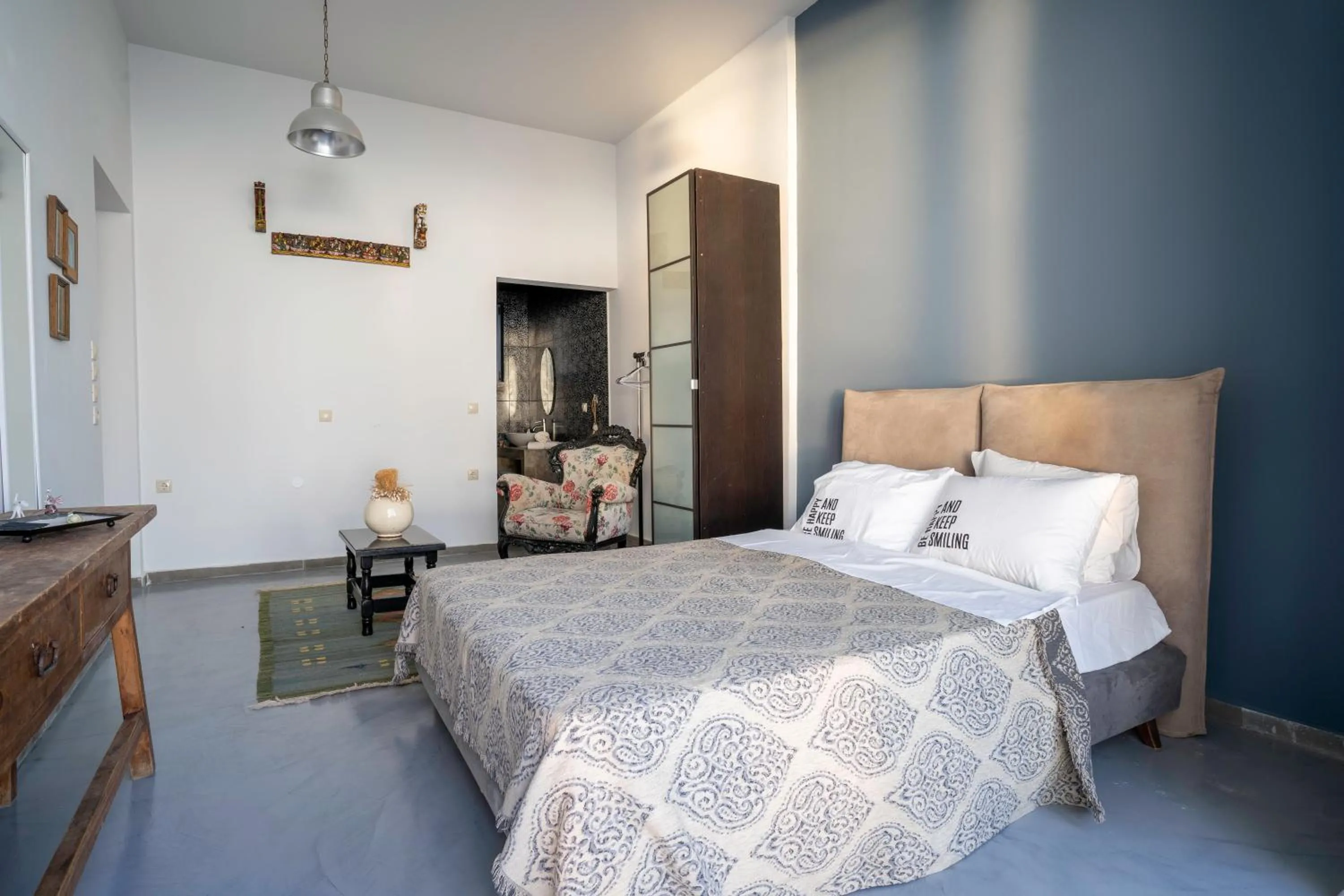 Bed in Serenity Boutique Suites