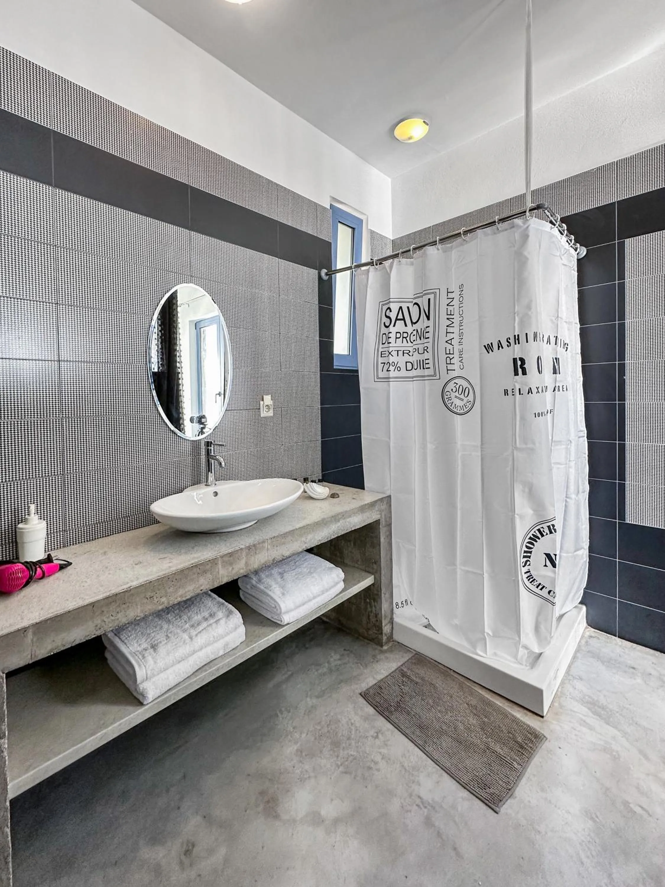 Shower in Serenity Boutique Suites