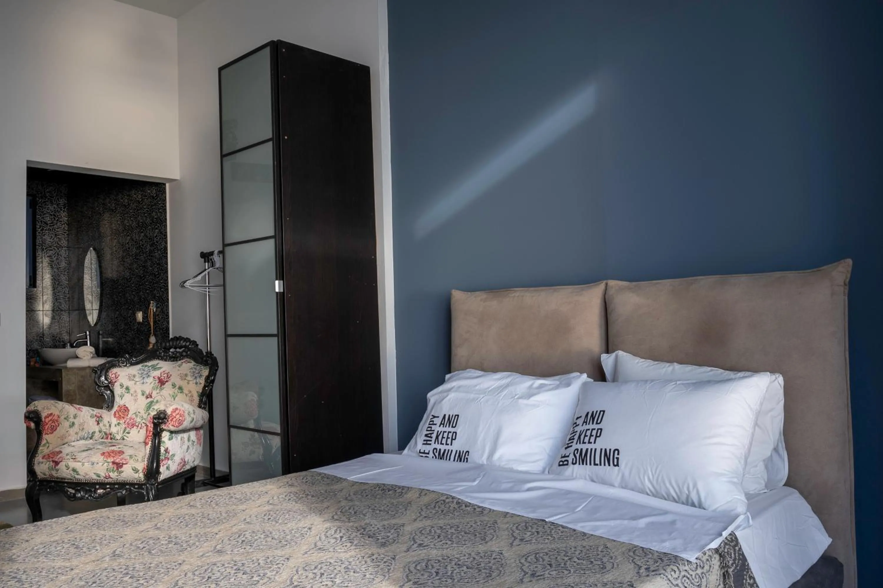 Bed in Serenity Boutique Suites