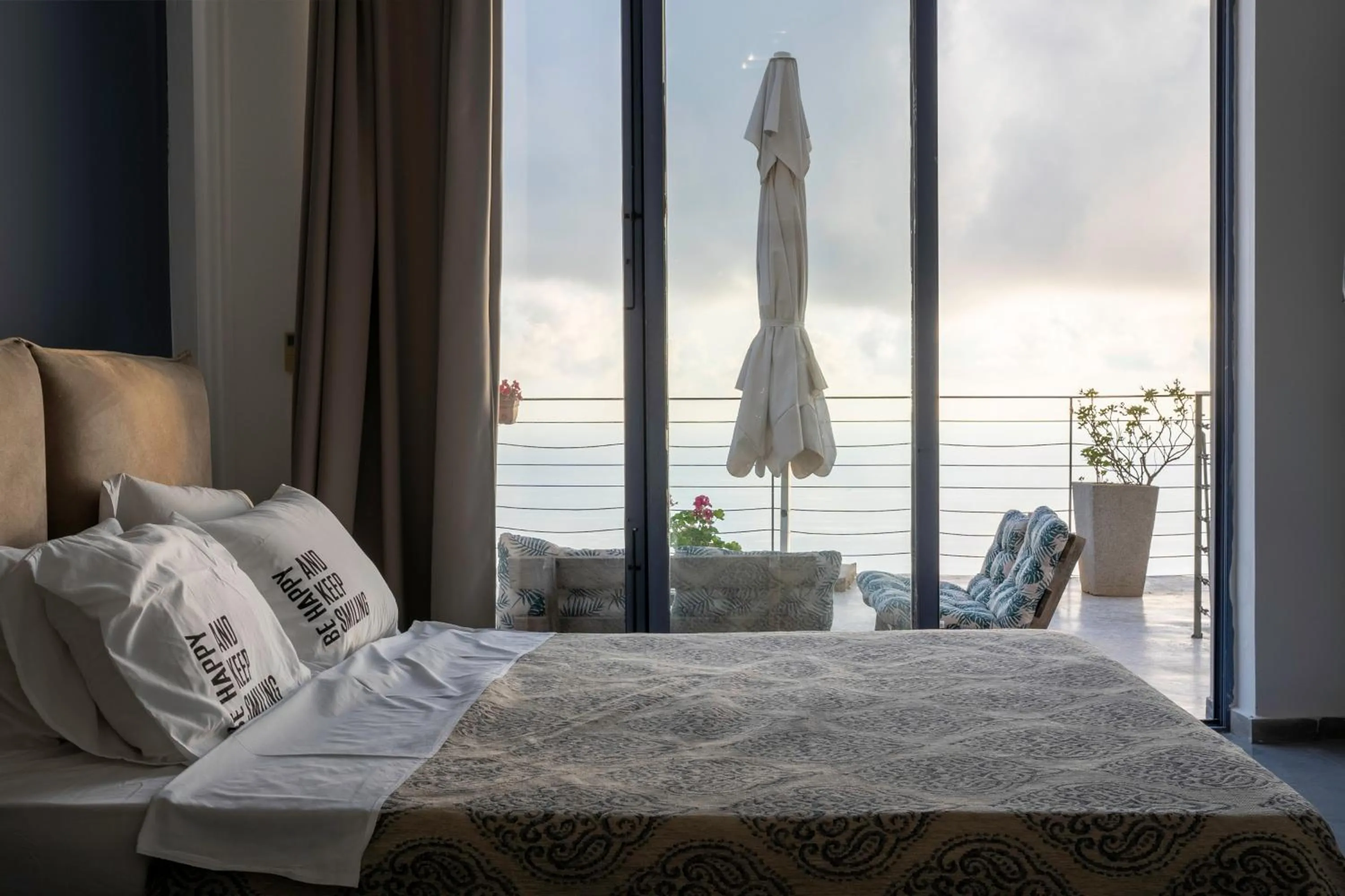 Bed in Serenity Boutique Suites