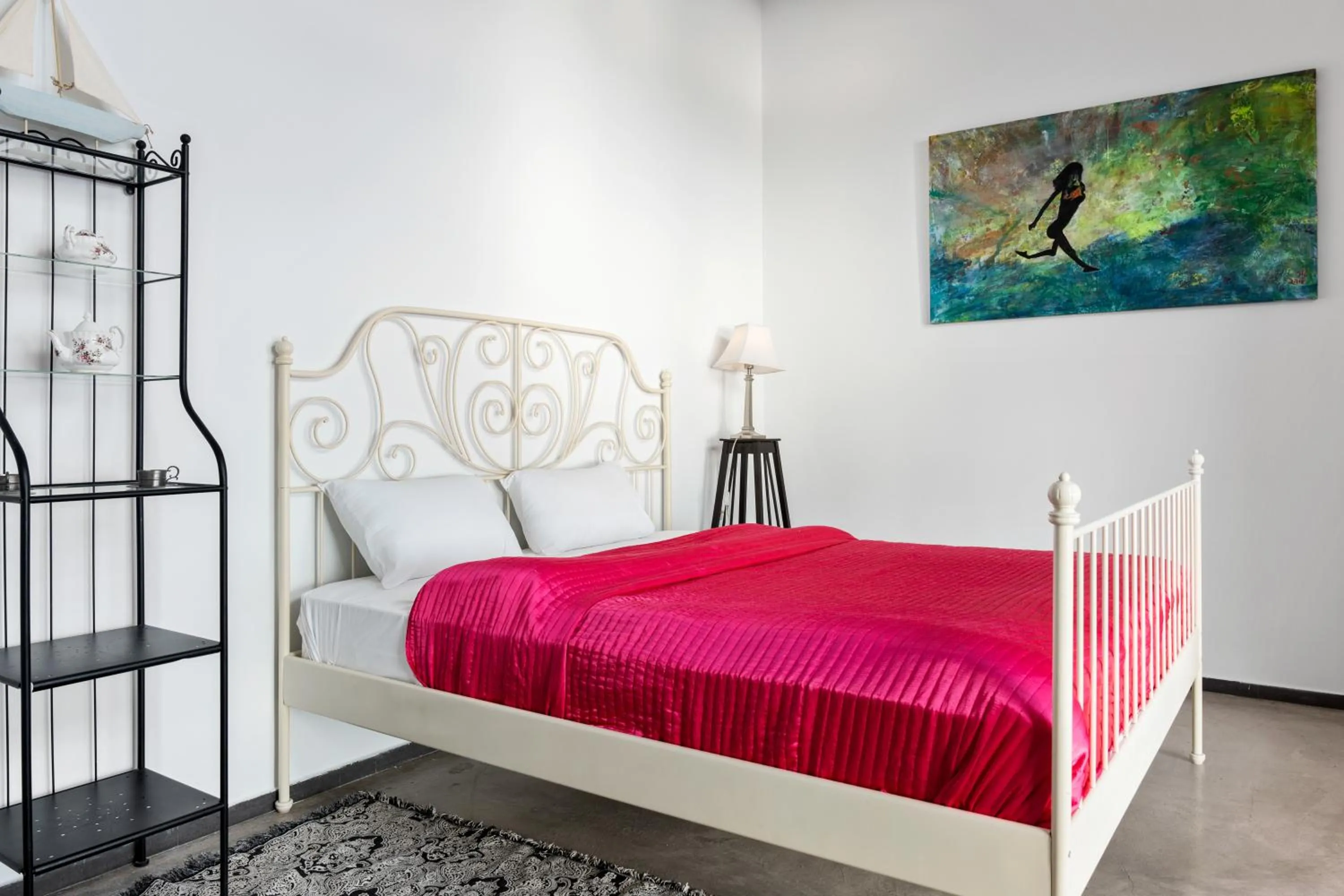 Bed in Serenity Boutique Suites