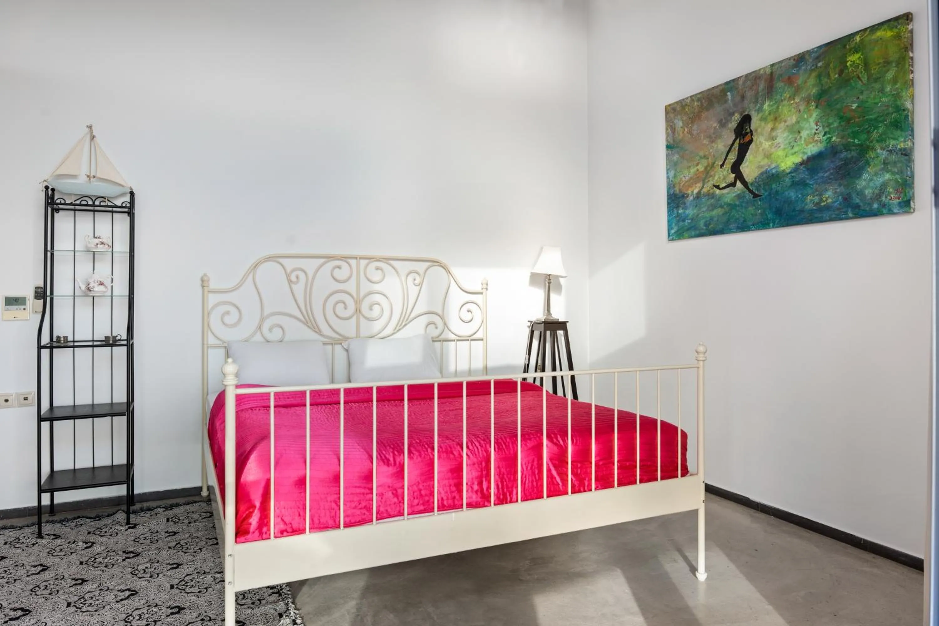 Bed in Serenity Boutique Suites
