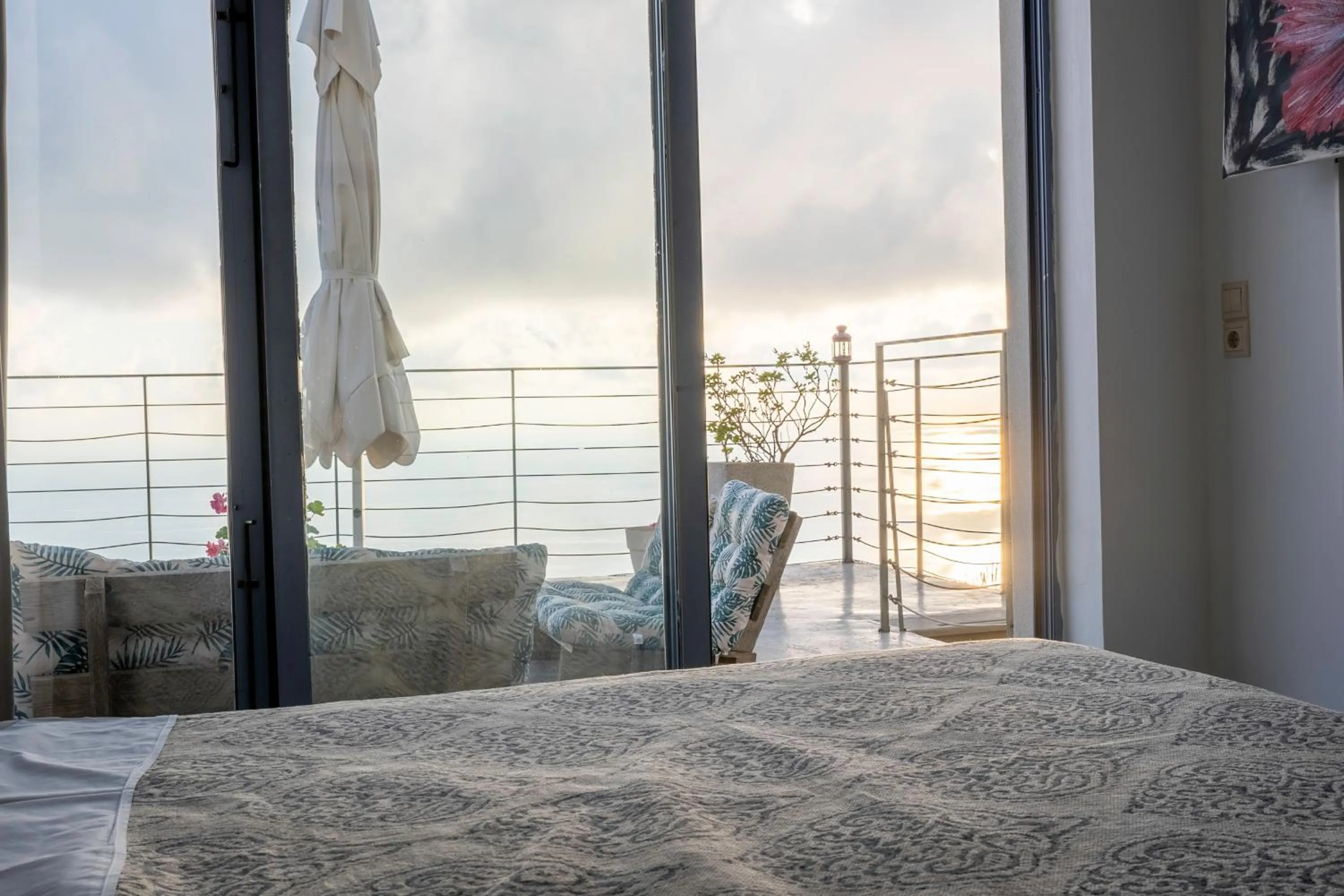 Bed in Serenity Boutique Suites