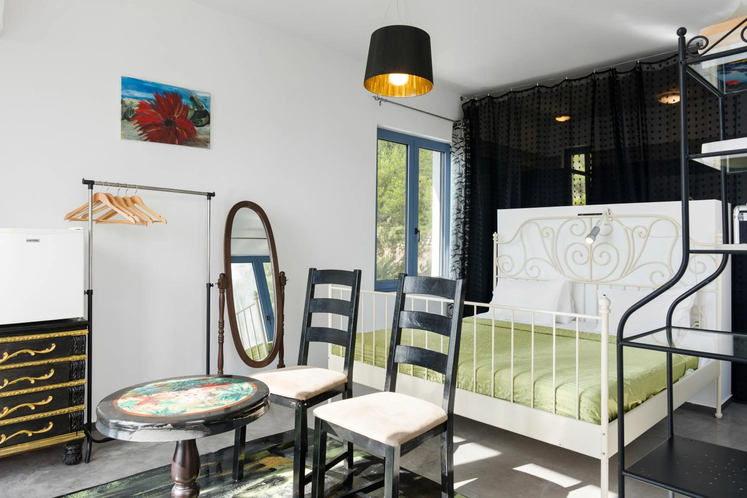 Bed in Serenity Boutique Suites
