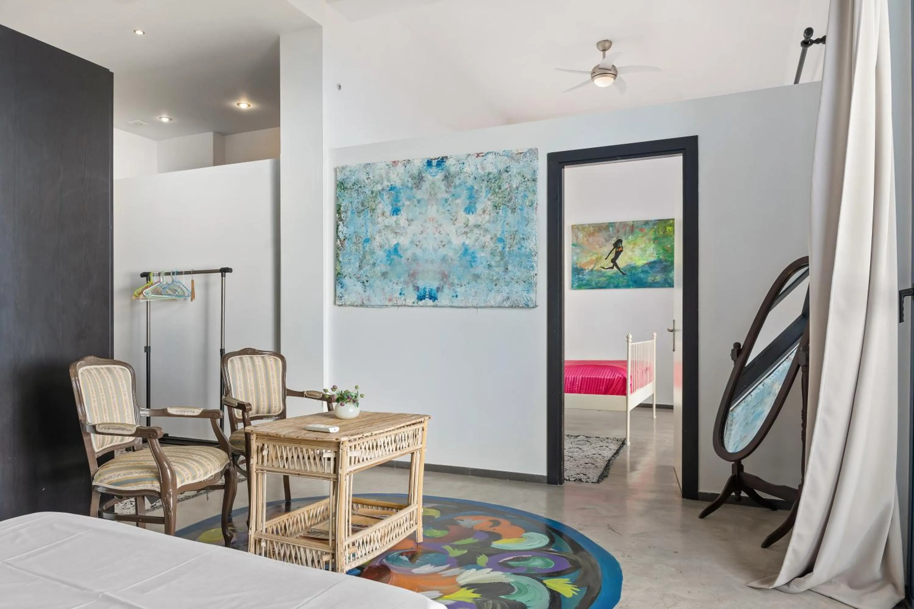 Bed in Serenity Boutique Suites