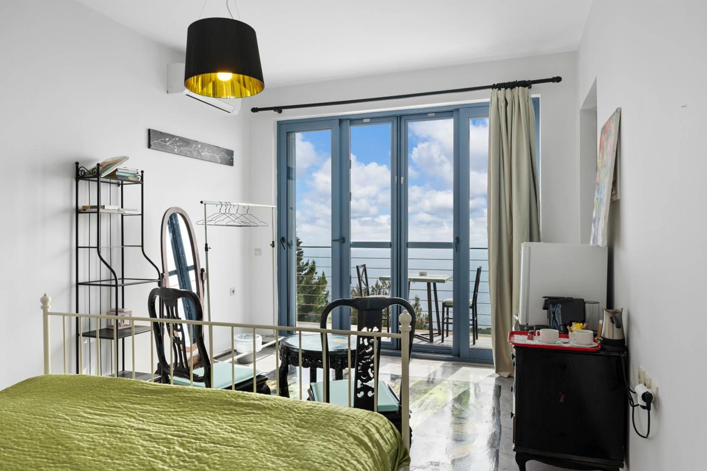 Bed in Serenity Boutique Suites