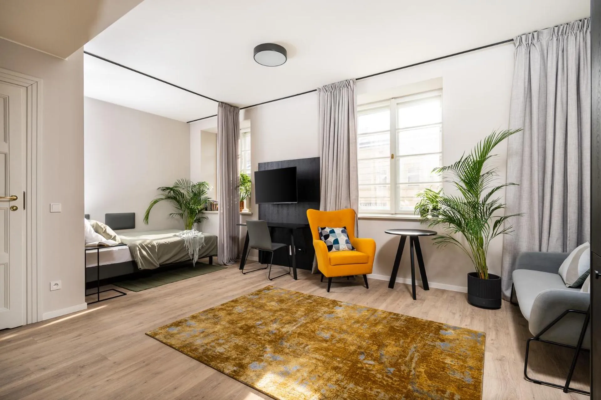 Photo of the whole room in MILESTONE Krakow Center Premium Living by Tribera