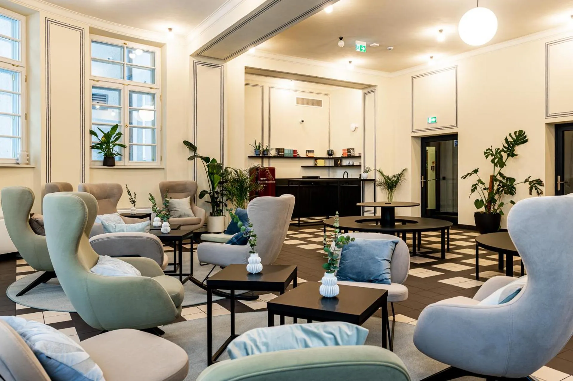 Communal lounge/ TV room in MILESTONE Krakow Center Premium Living by Tribera