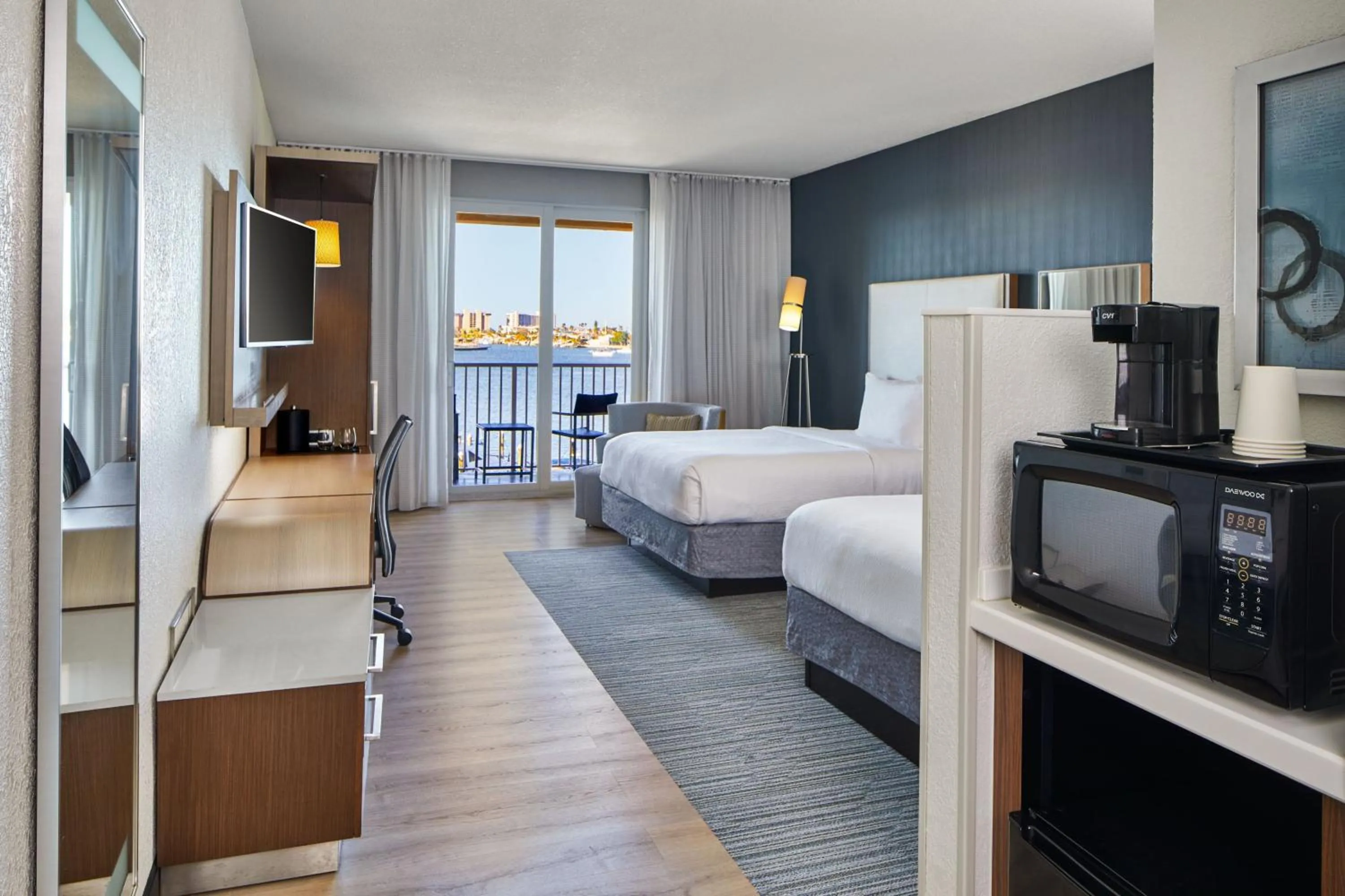 Swimming pool, Bed in Courtyard by Marriott St. Petersburg Clearwater/Madeira Beach