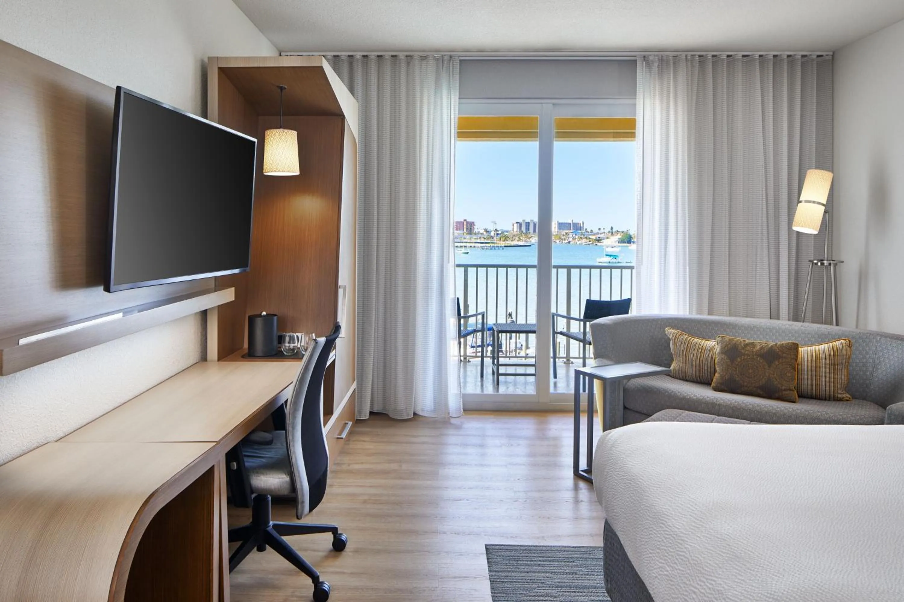 Swimming pool, Bed in Courtyard by Marriott St. Petersburg Clearwater/Madeira Beach