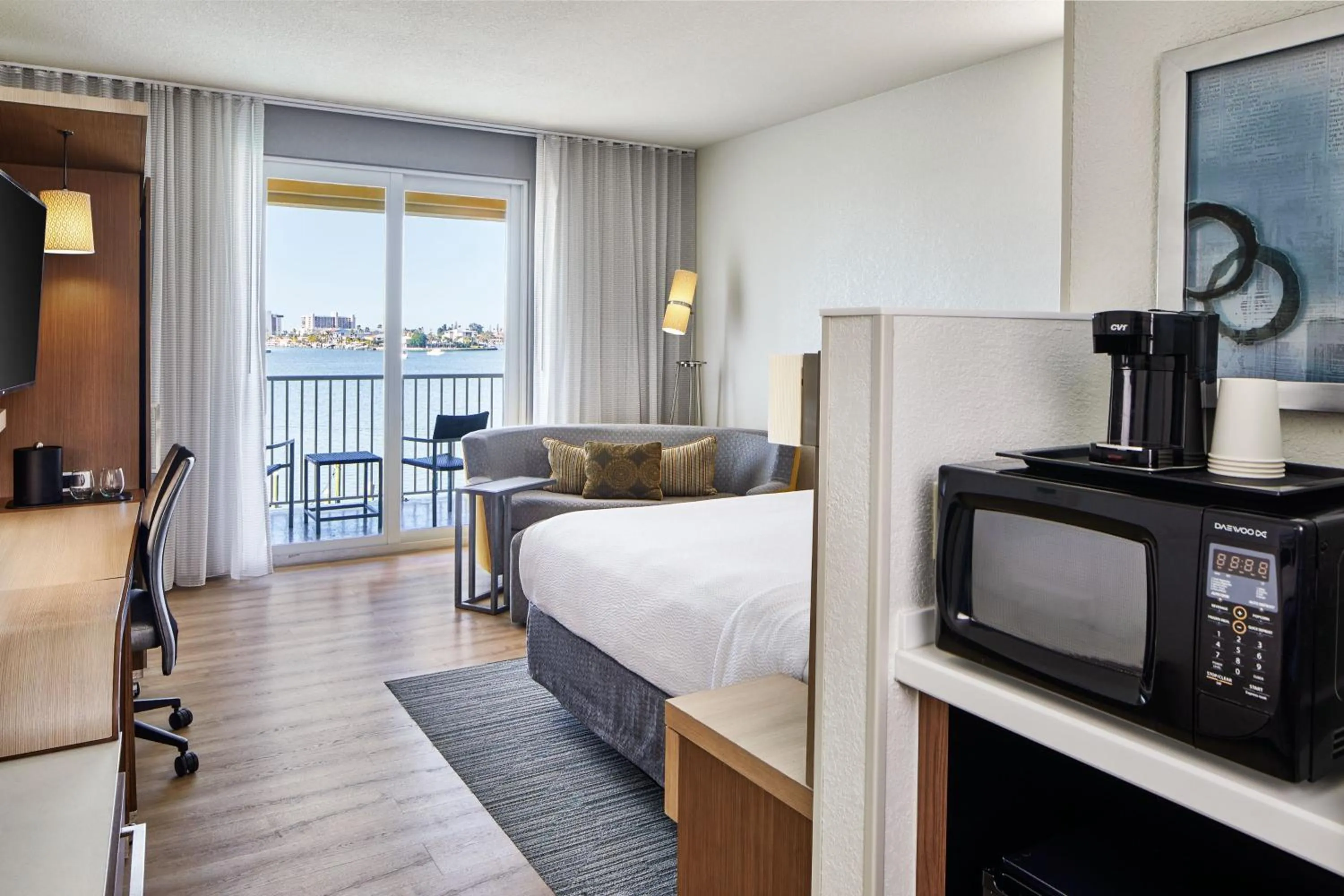 Swimming pool, Bed in Courtyard by Marriott St. Petersburg Clearwater/Madeira Beach