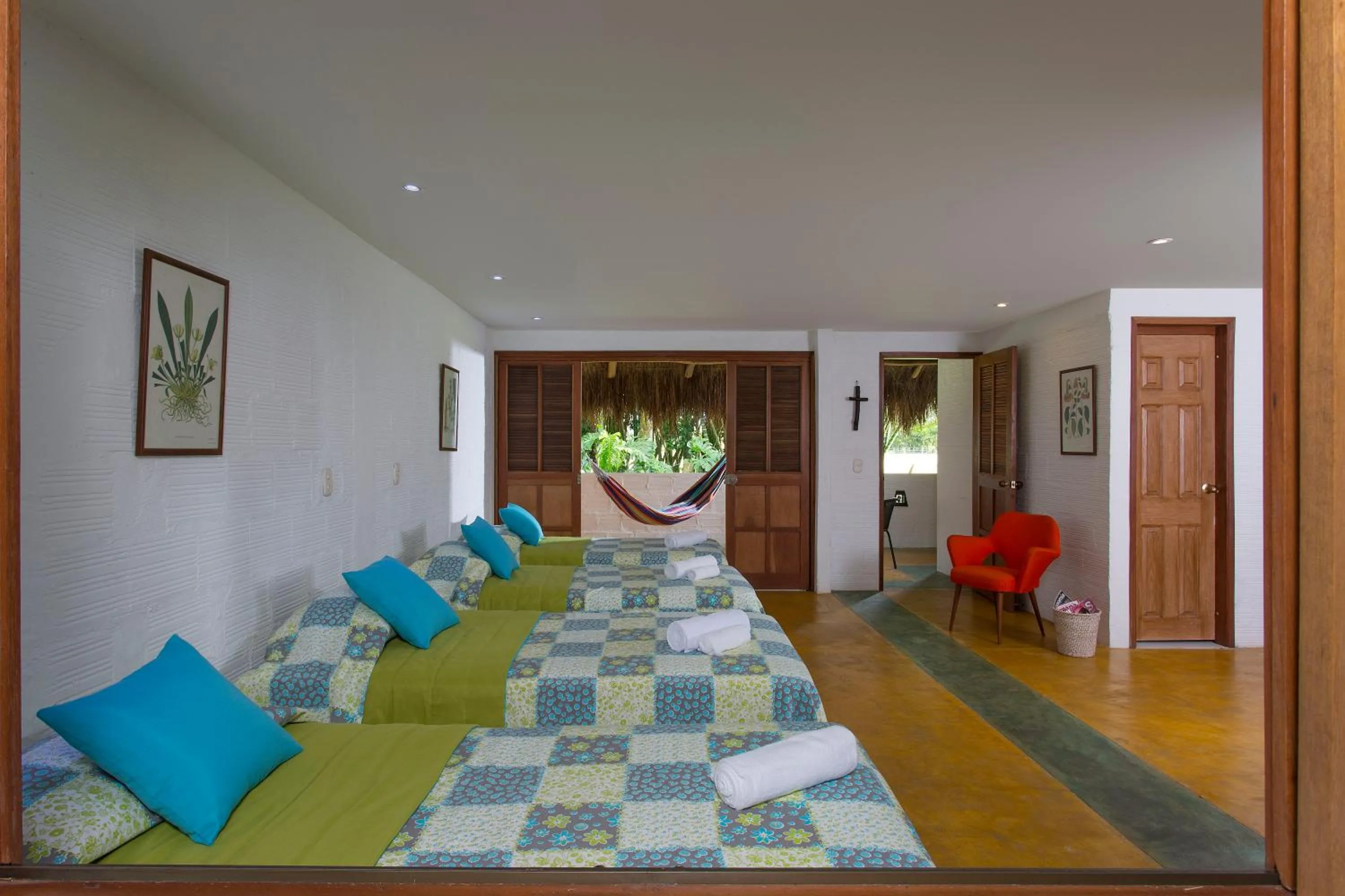 Quadruple Room with Garden View in Hotel Cinaruco Caney
