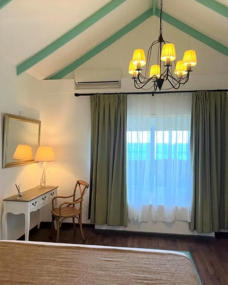 Bedroom in Hotel Boutique La Perouse