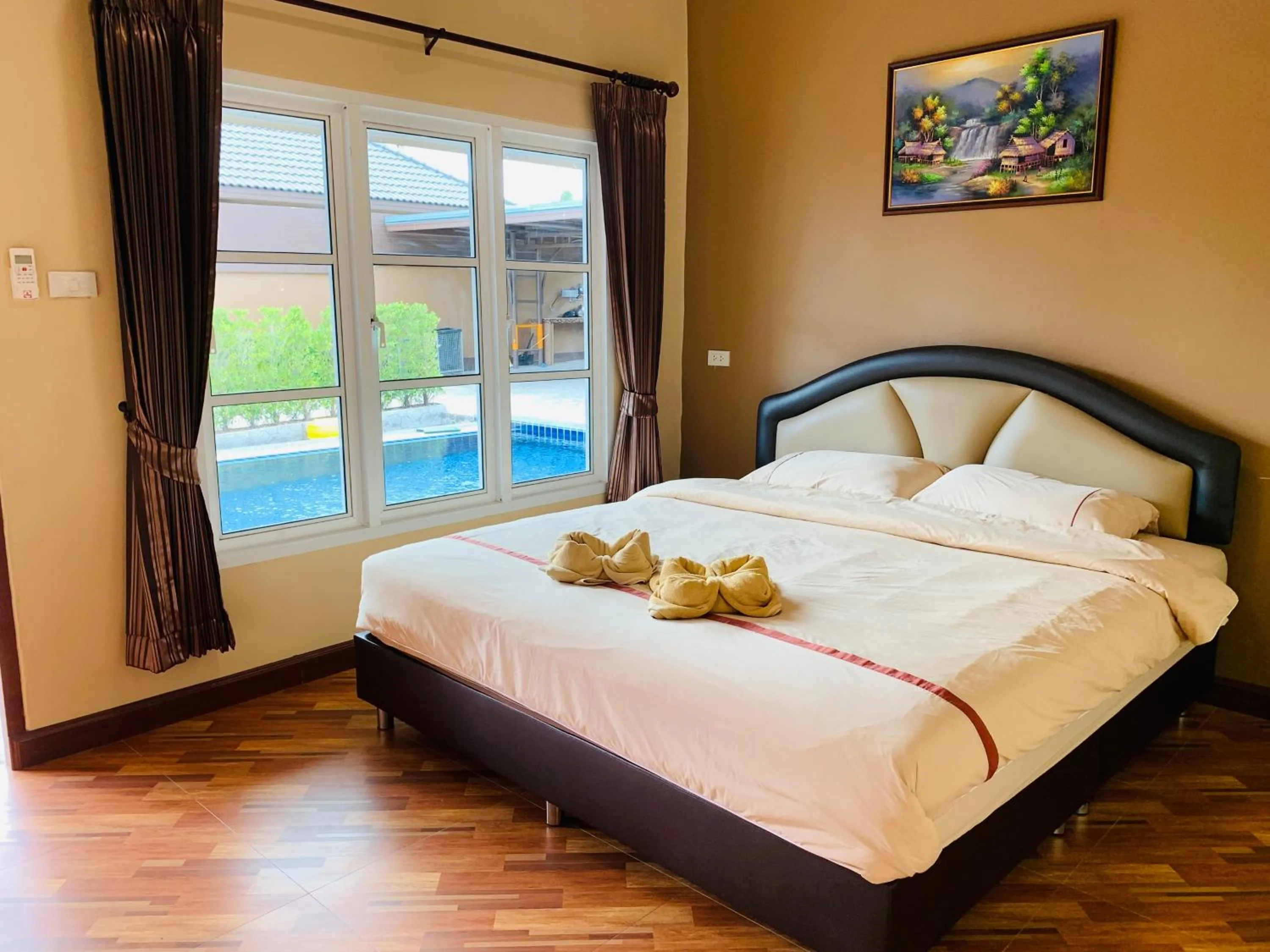 Bed in Benwadee Resort Pattaya