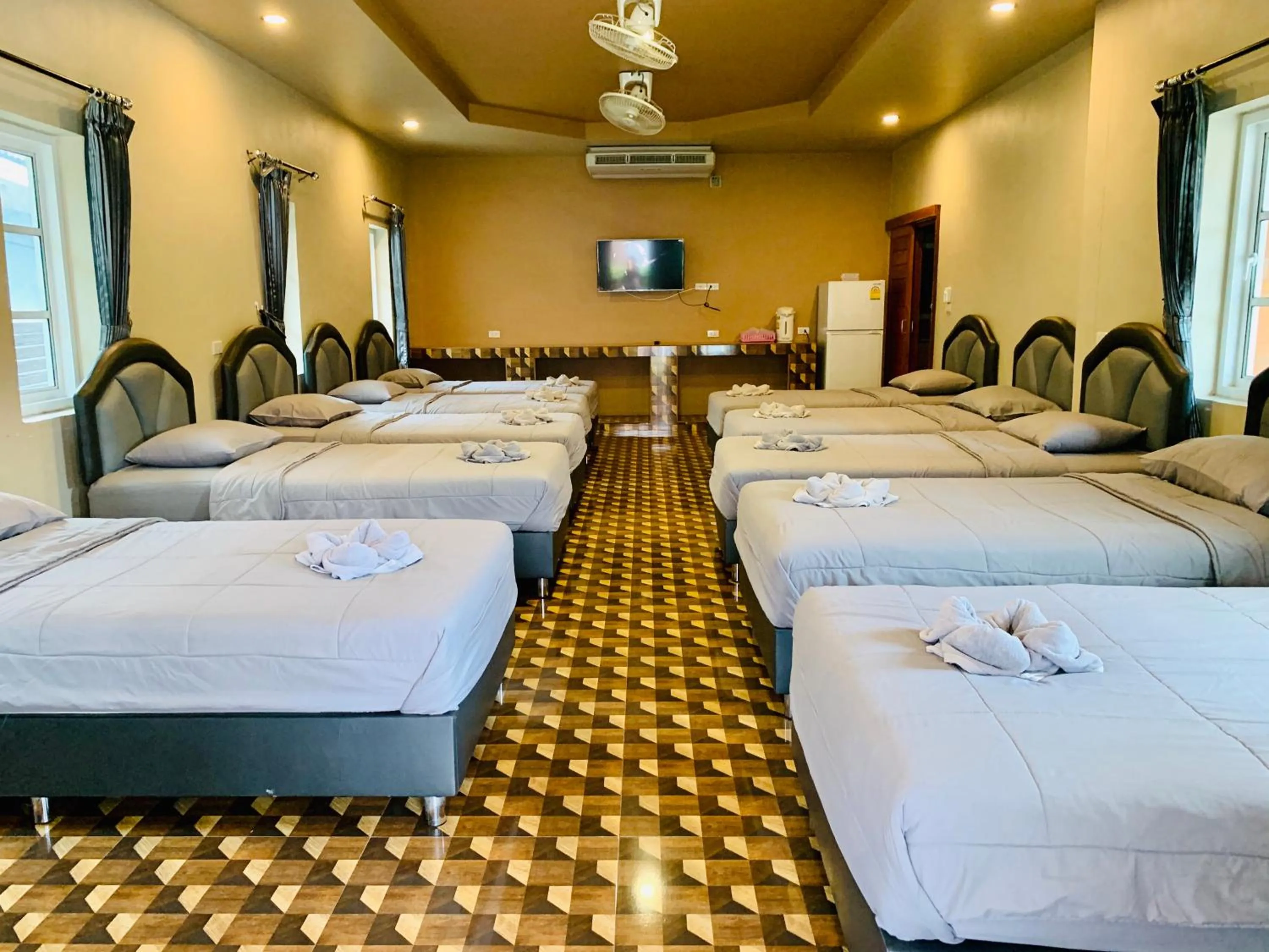 Bed in Benwadee Resort Pattaya