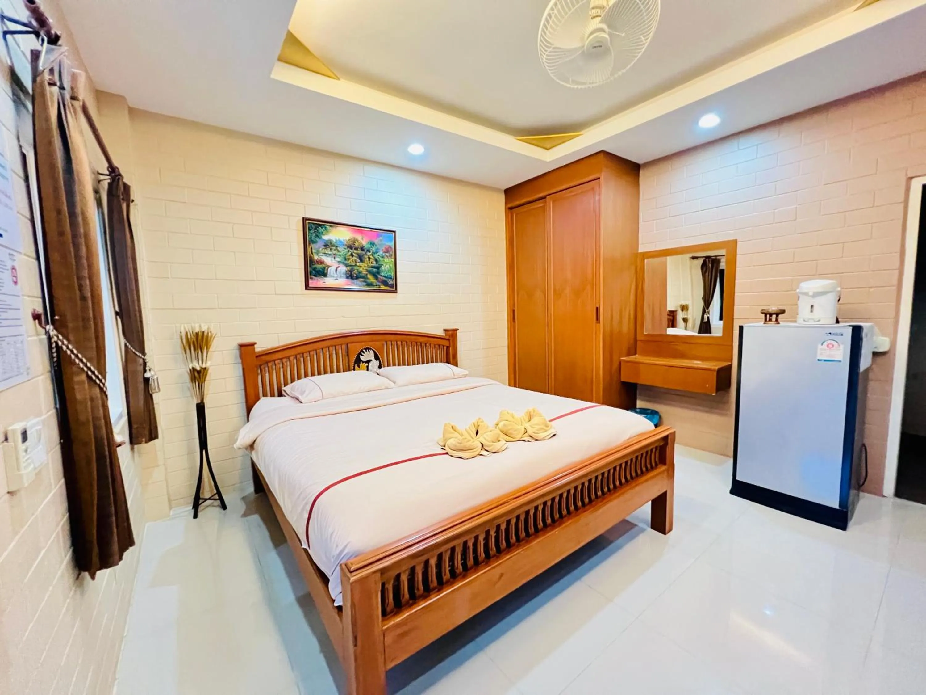 Bed in Benwadee Resort Pattaya