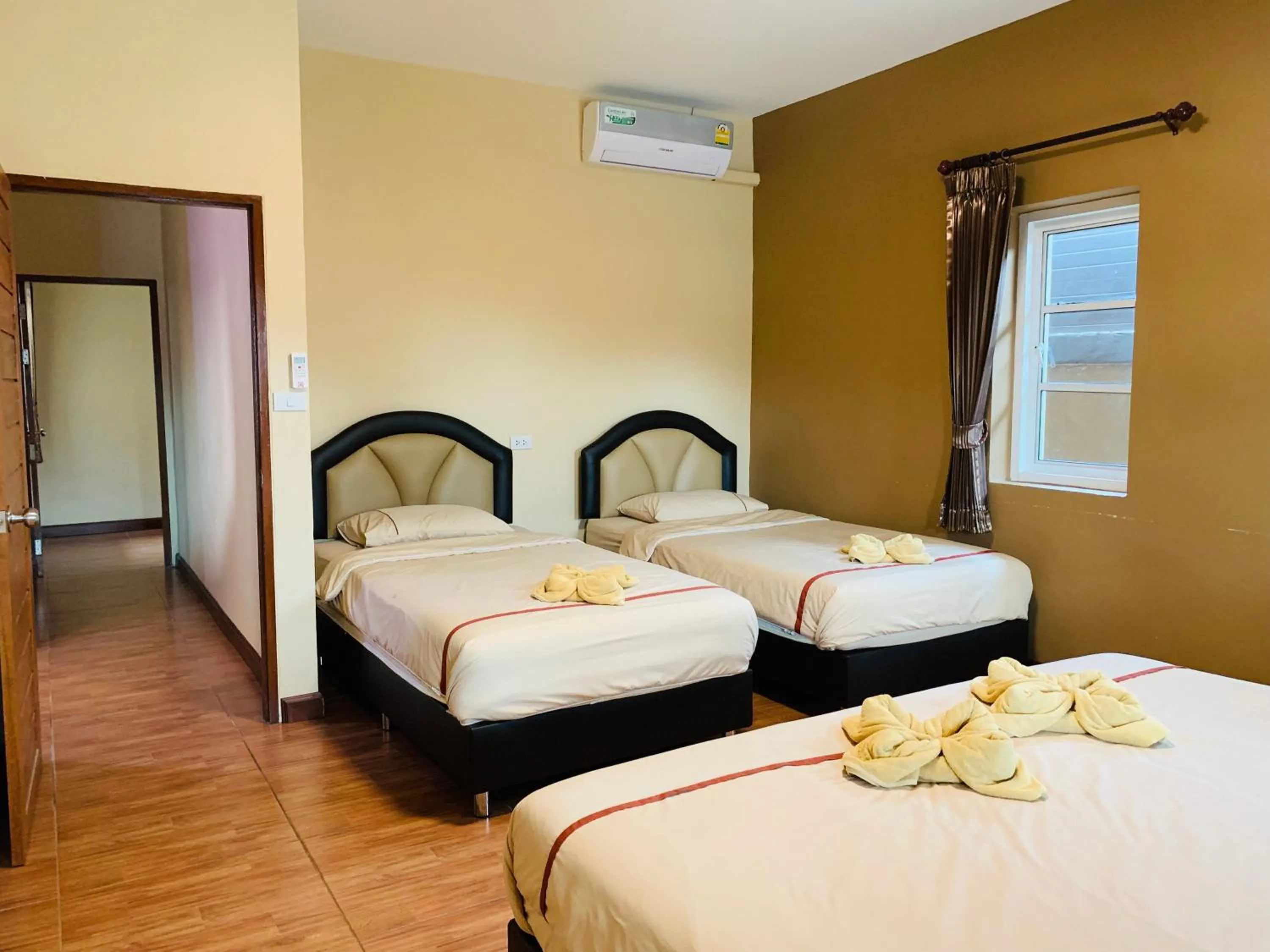 Bed in Benwadee Resort Pattaya