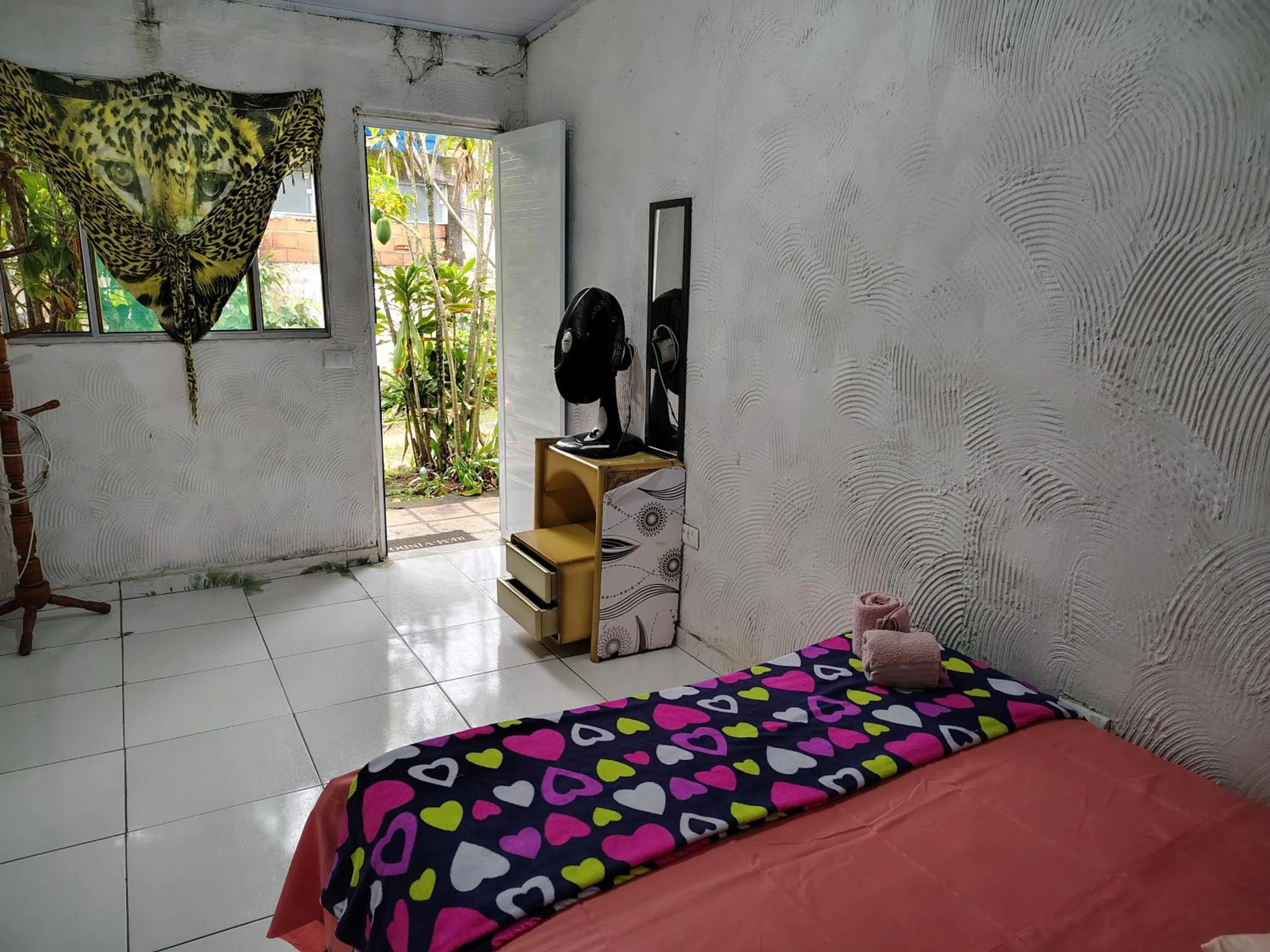 Bed in Pousada Lambaris Pereque Guarujá