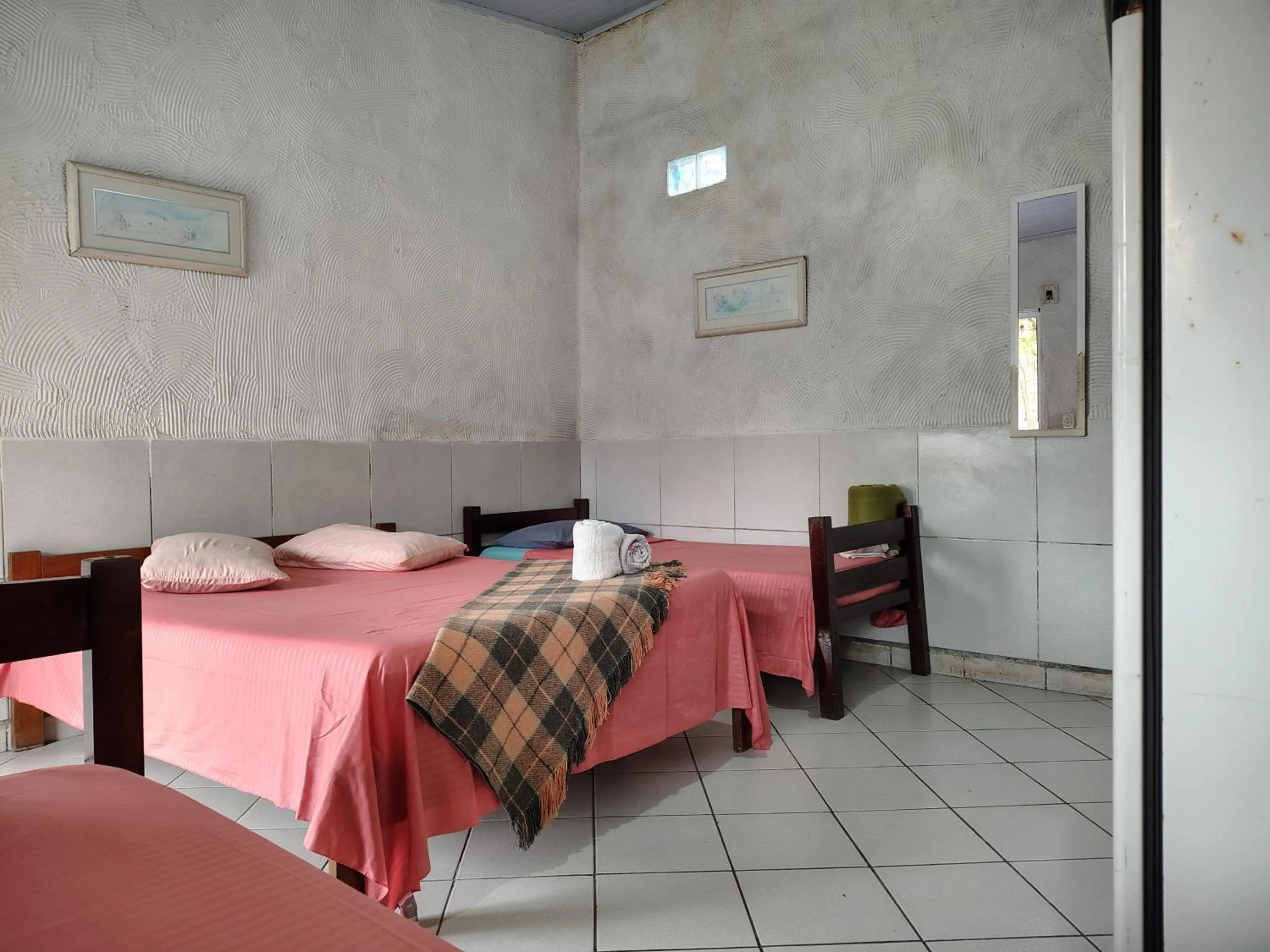 Bed in Pousada Lambaris Pereque Guarujá