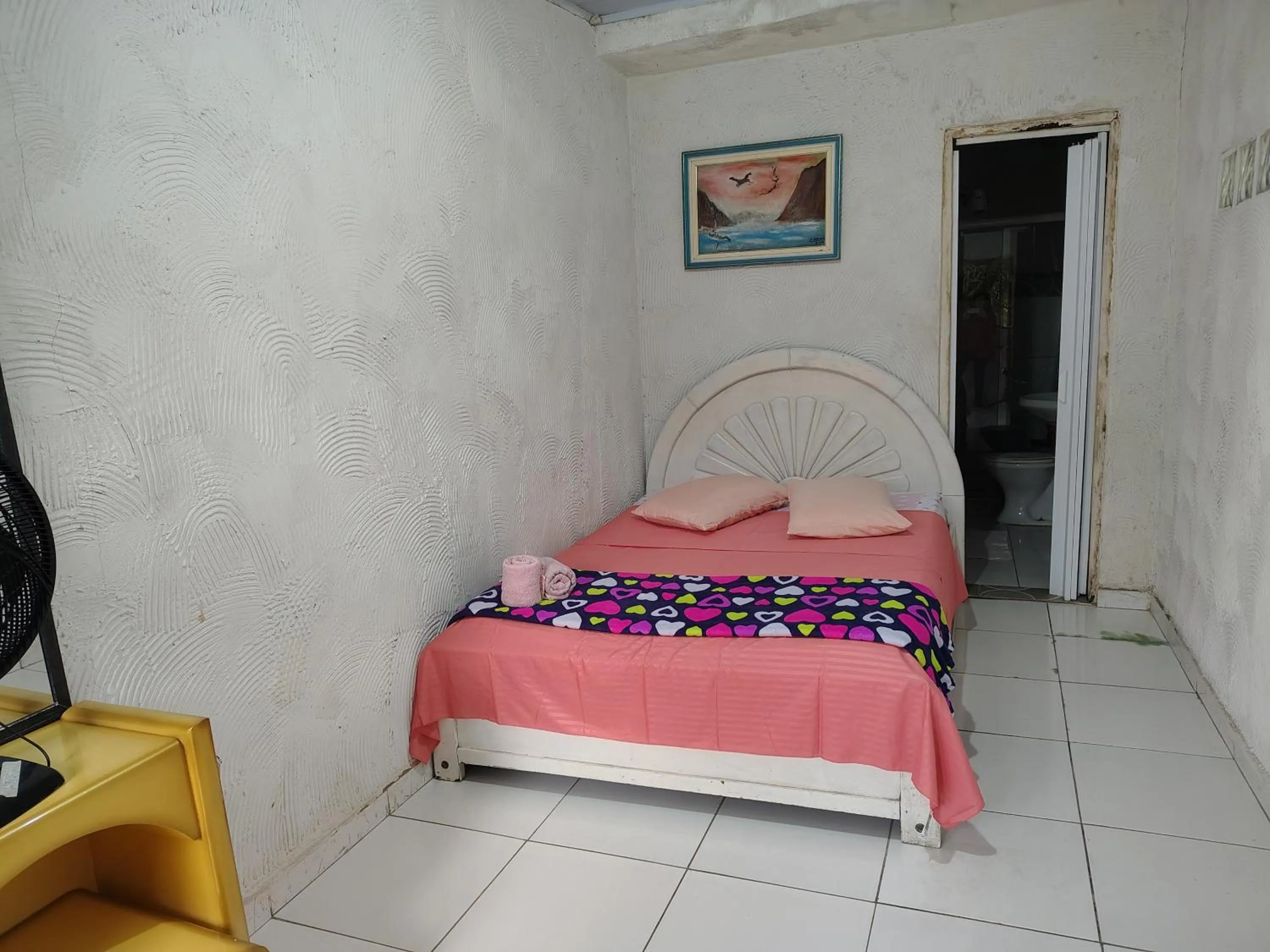 Bed in Pousada Lambaris Pereque Guarujá