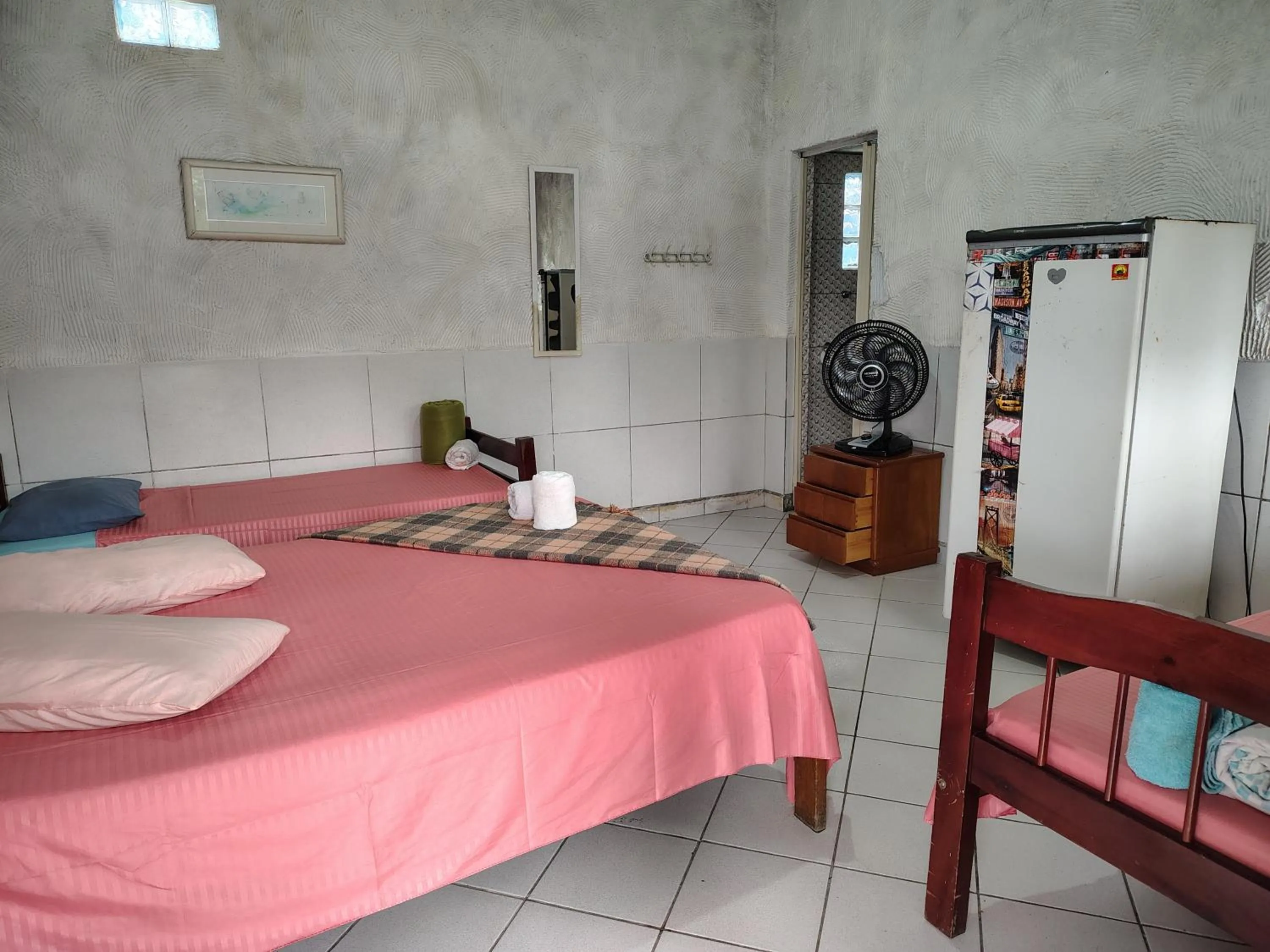 Bed in Pousada Lambaris Pereque Guarujá