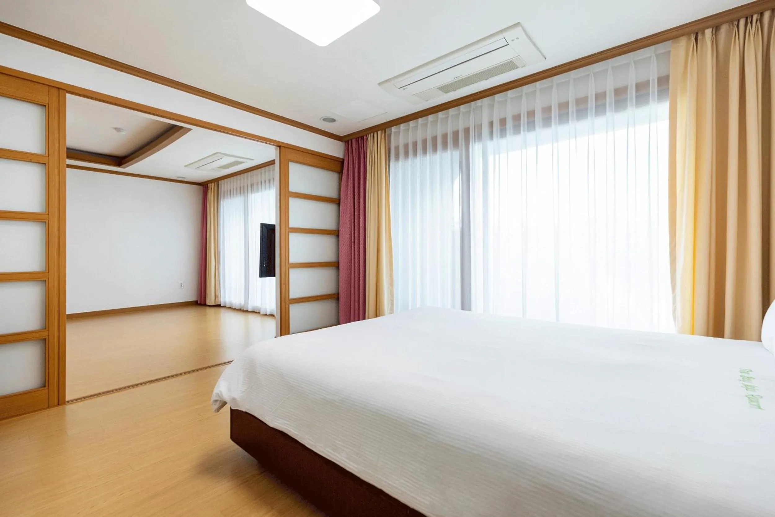 Bed in The Bay Jeju Resort