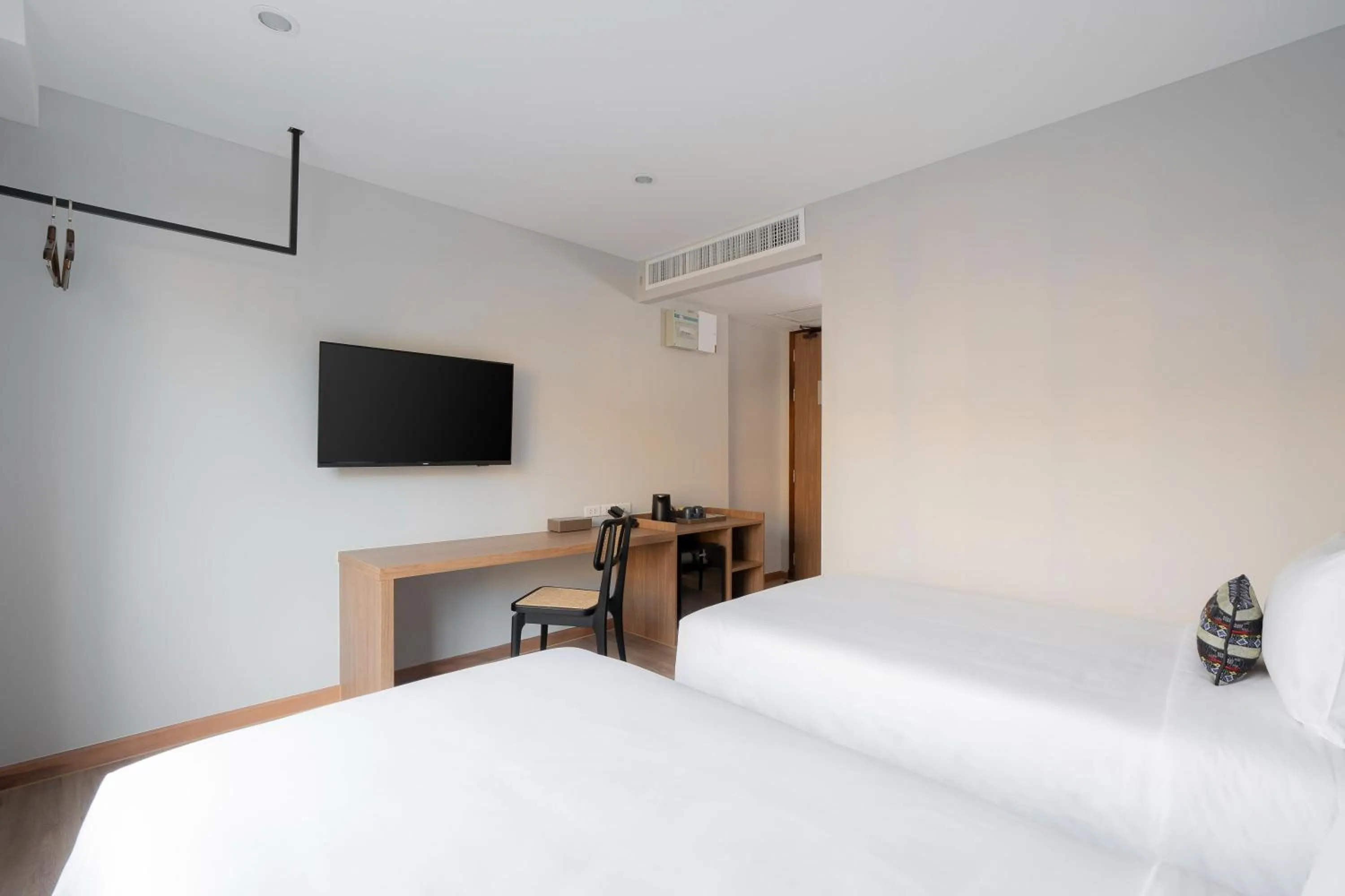 Bed in Pranakorn Heritage Hotel