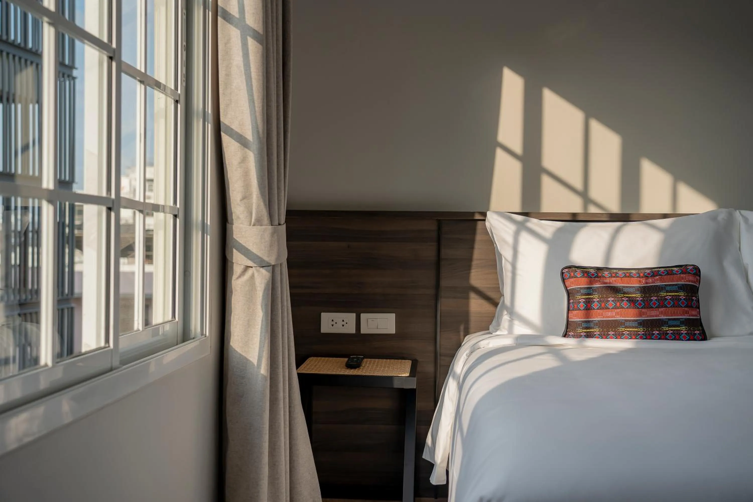 Bed in Pranakorn Heritage Hotel