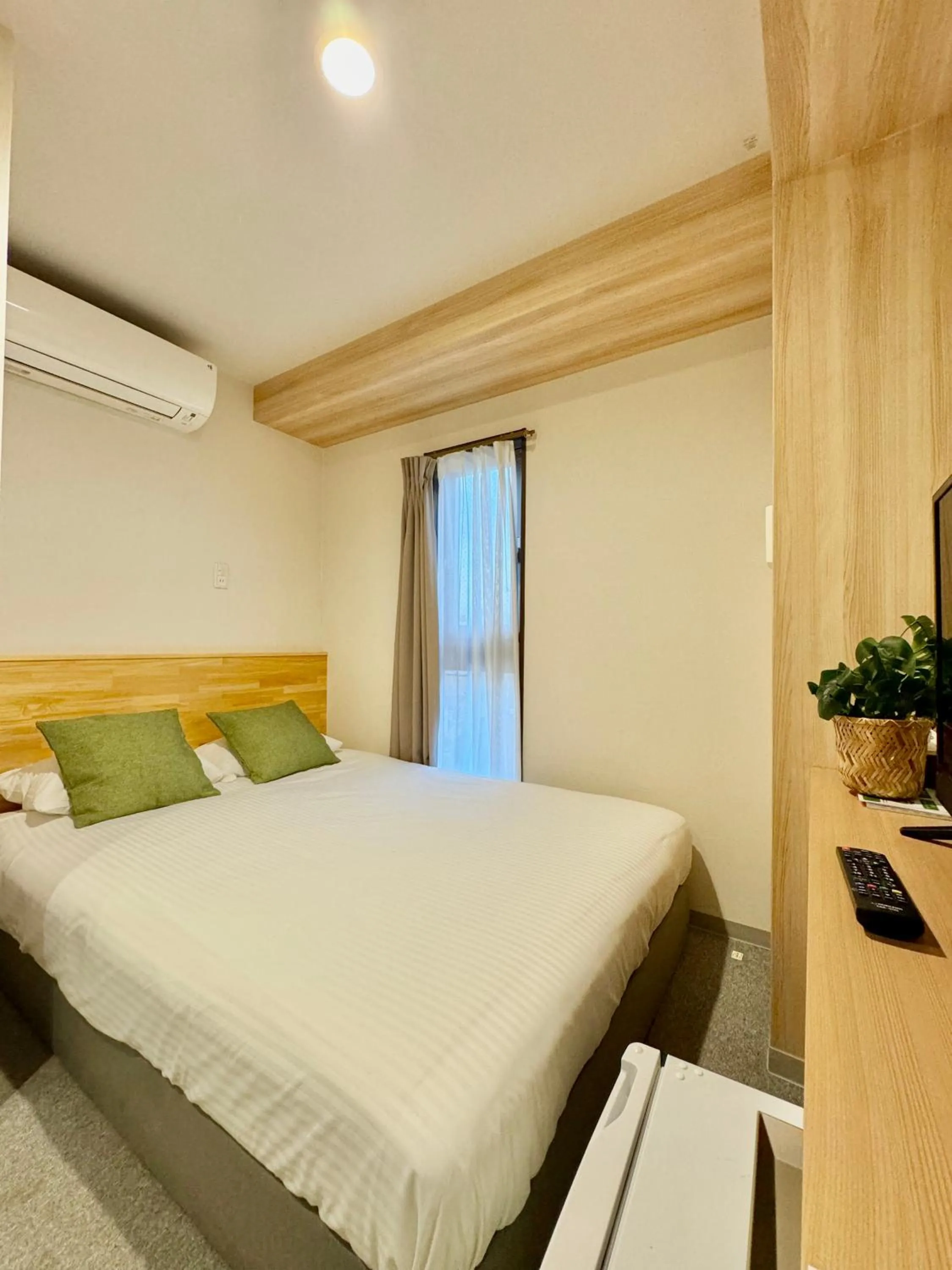 Bed in Y&Y NAMBA HOTEL Osaka