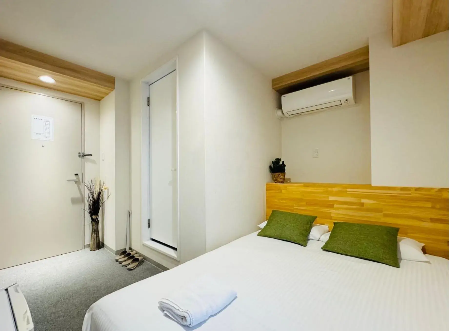 Bed in Y&Y NAMBA HOTEL Osaka Bed in Y&Y NAMBA HOTEL Osaka