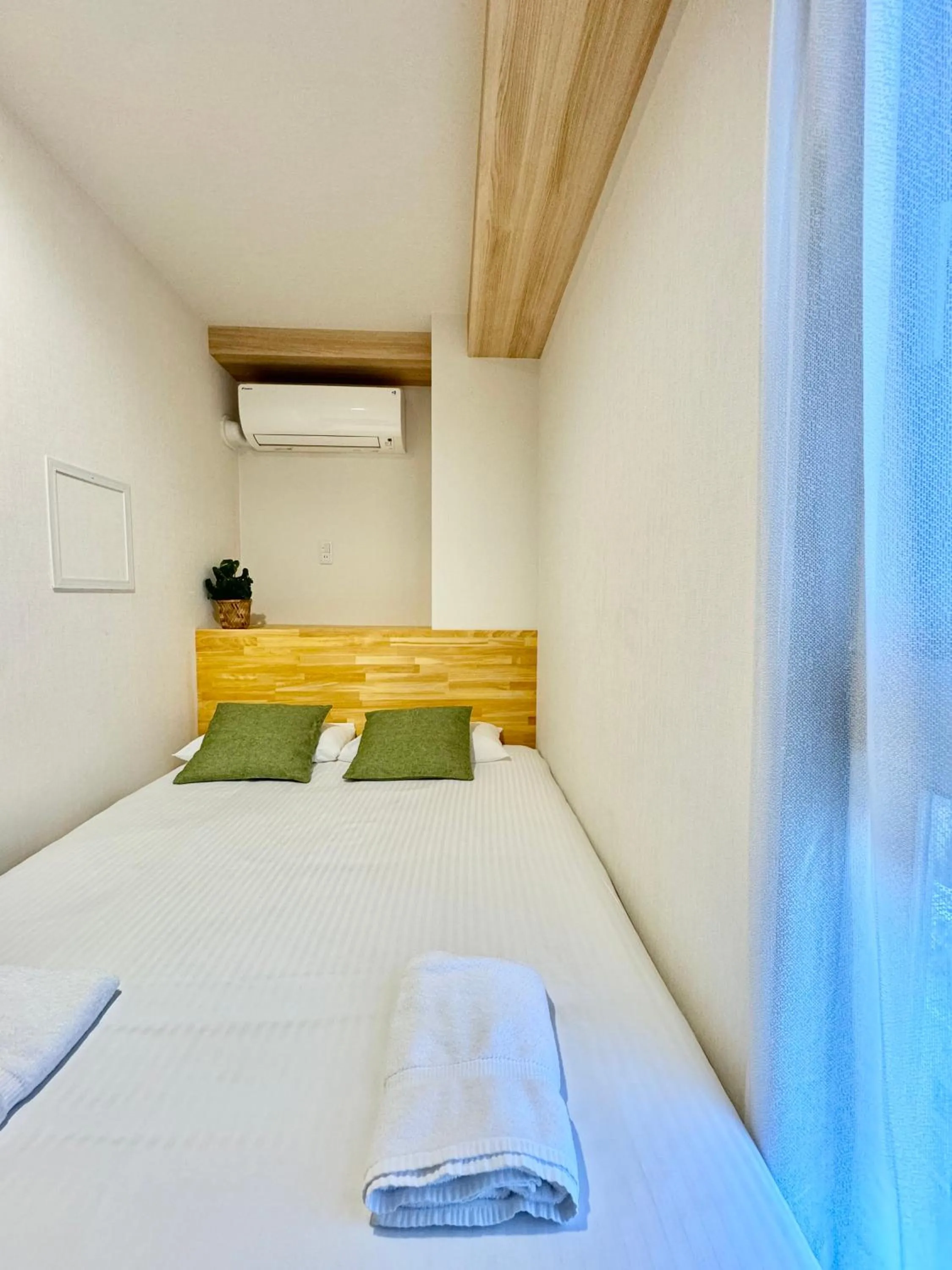 Bed in Y&Y NAMBA HOTEL Osaka