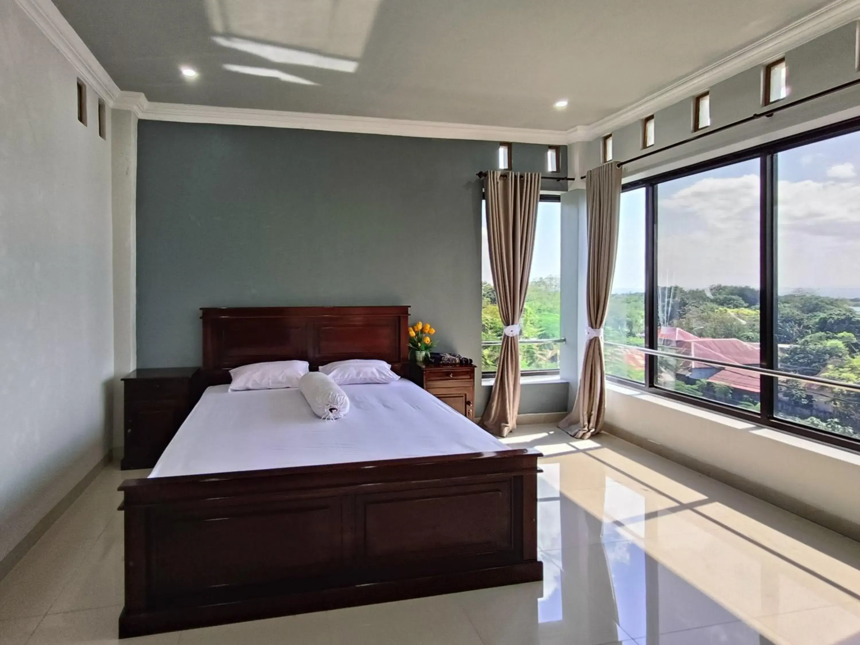 Bed in RedDoorz @ Green Homestay Syariah Baubau Bed in RedDoorz @ Green Homestay Syariah Baubau