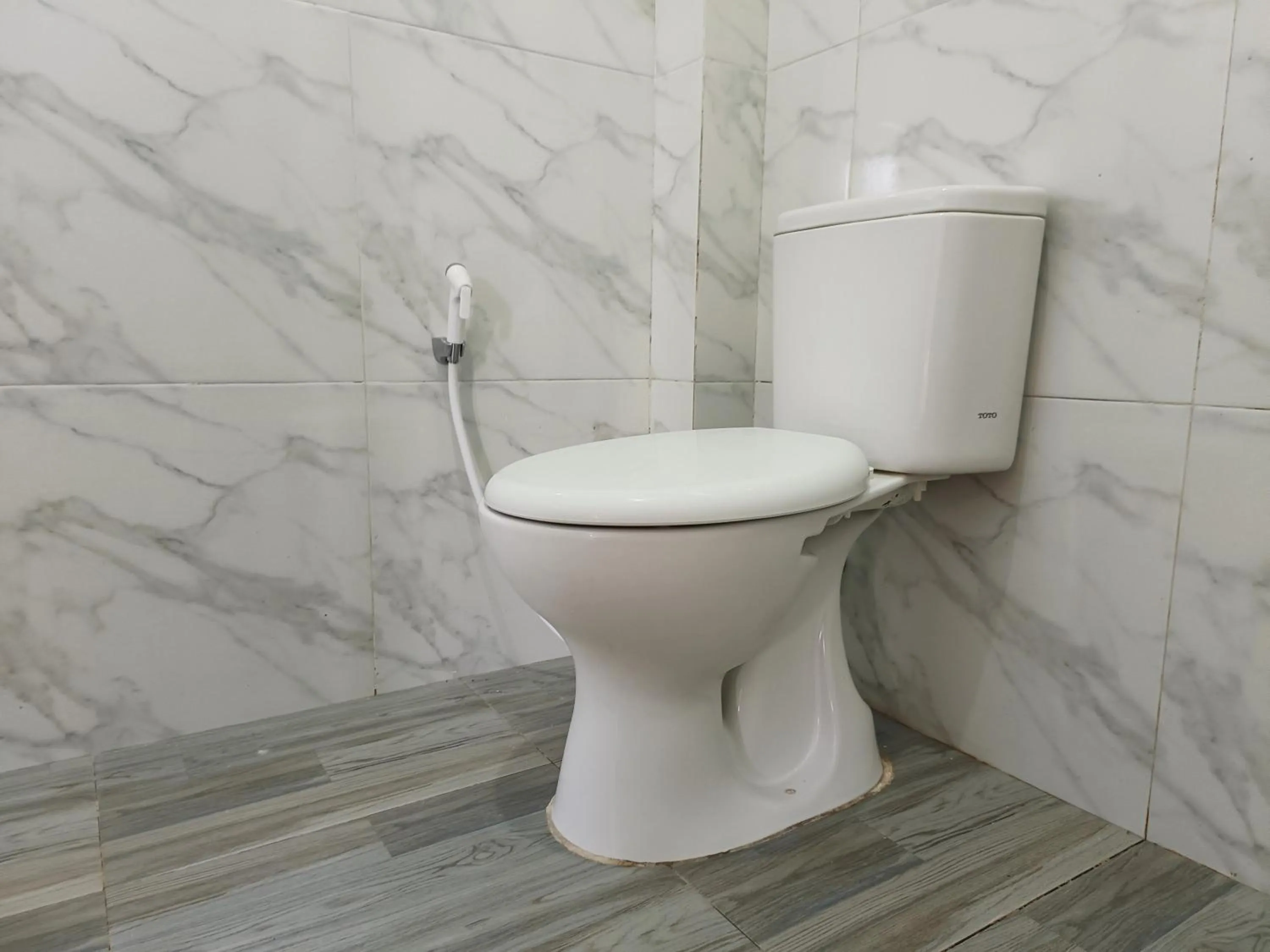 Toilet in RedDoorz @ Green Homestay Syariah Baubau