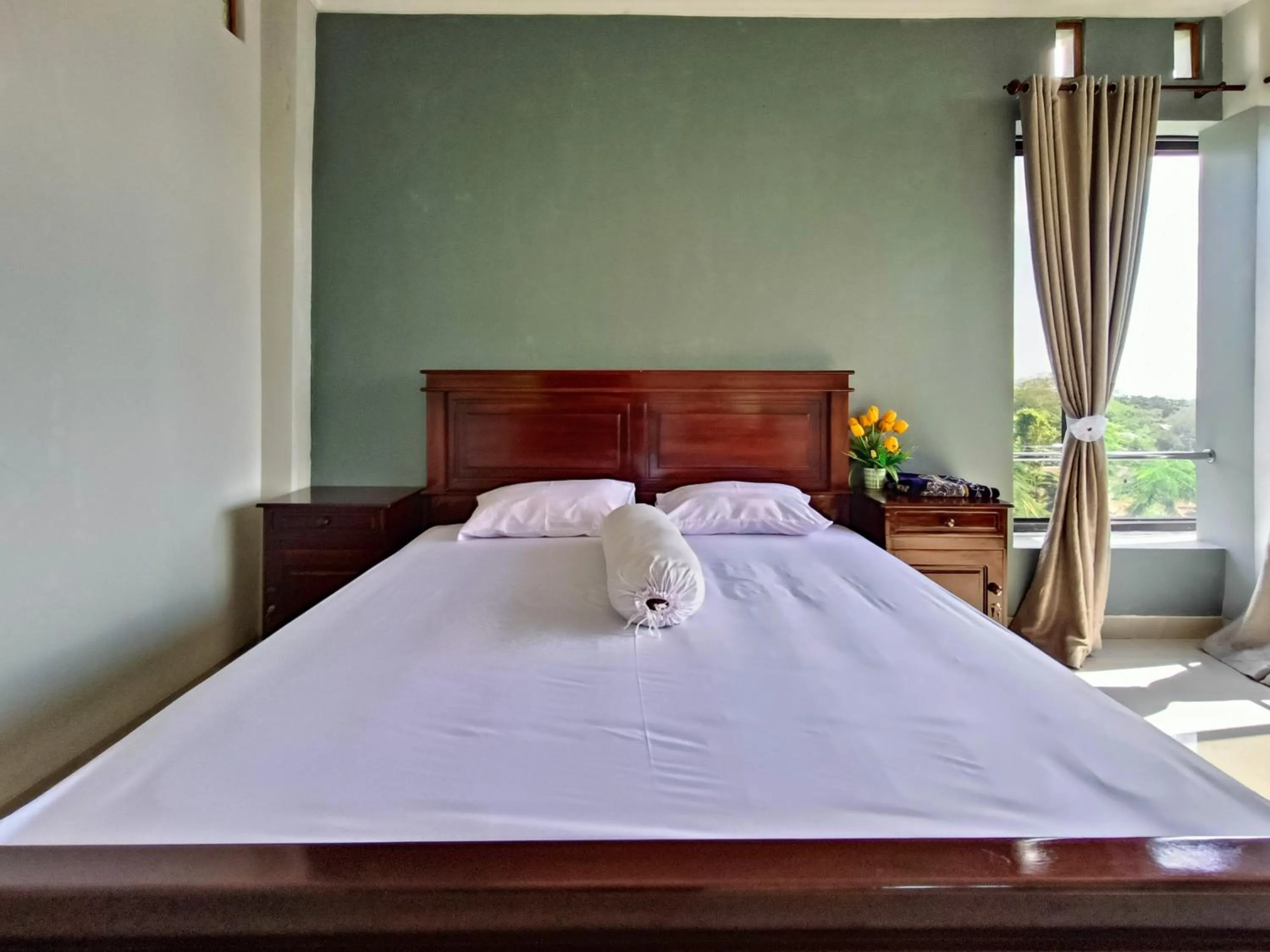 Bed in RedDoorz @ Green Homestay Syariah Baubau