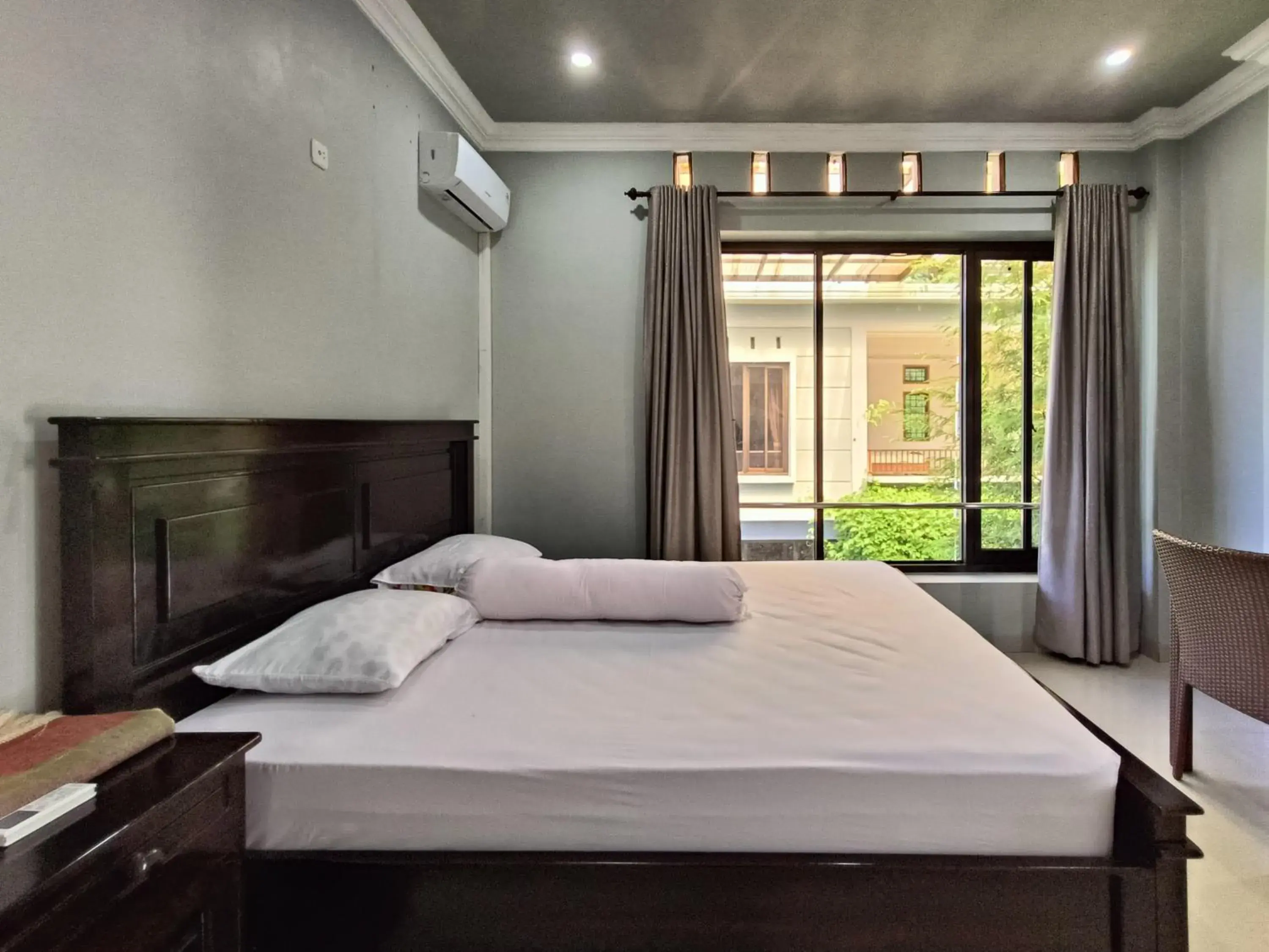 Bed in RedDoorz @ Green Homestay Syariah Baubau Bed in RedDoorz @ Green Homestay Syariah Baubau