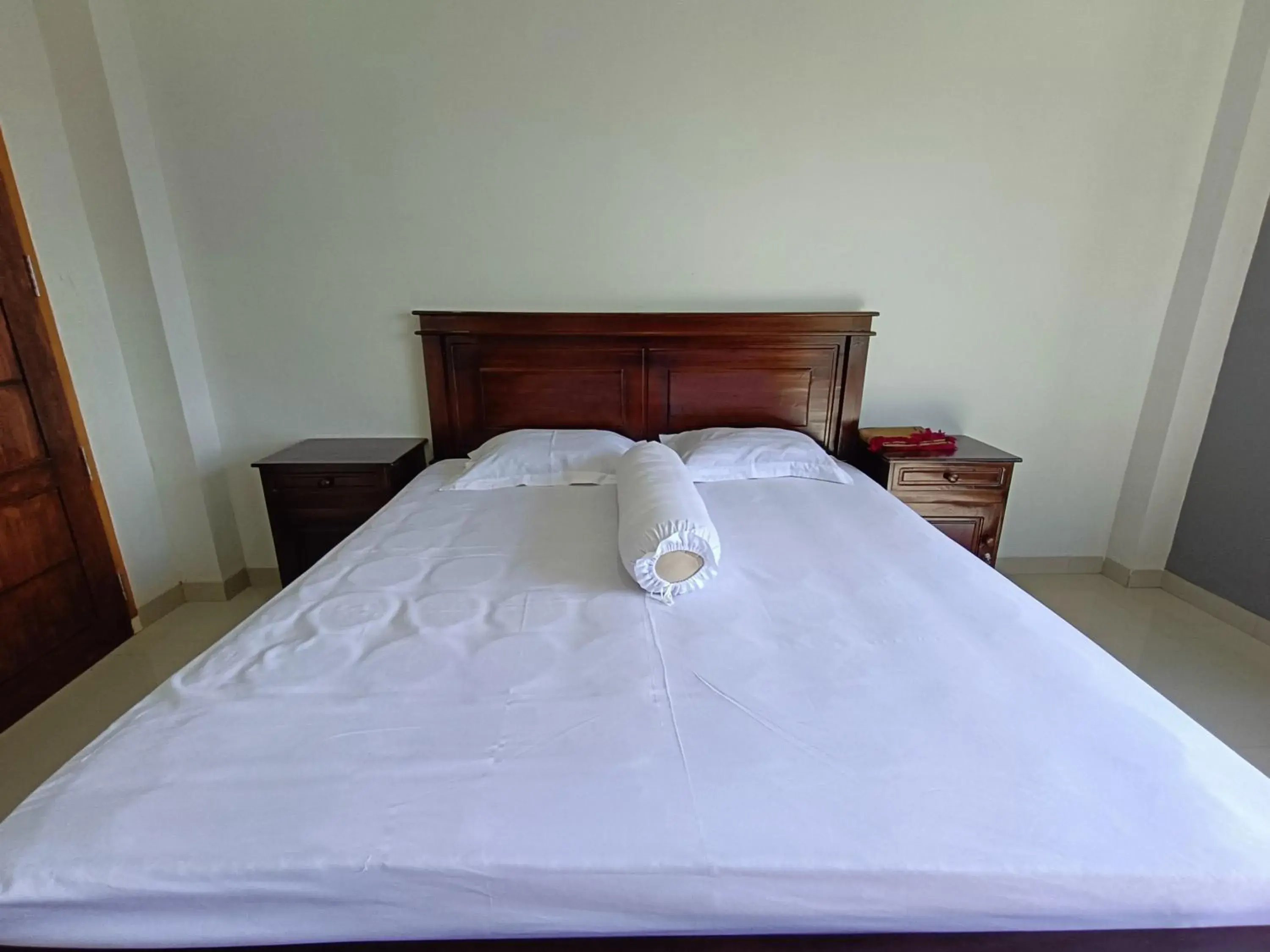 Bed in RedDoorz @ Green Homestay Syariah Baubau Bed in RedDoorz @ Green Homestay Syariah Baubau