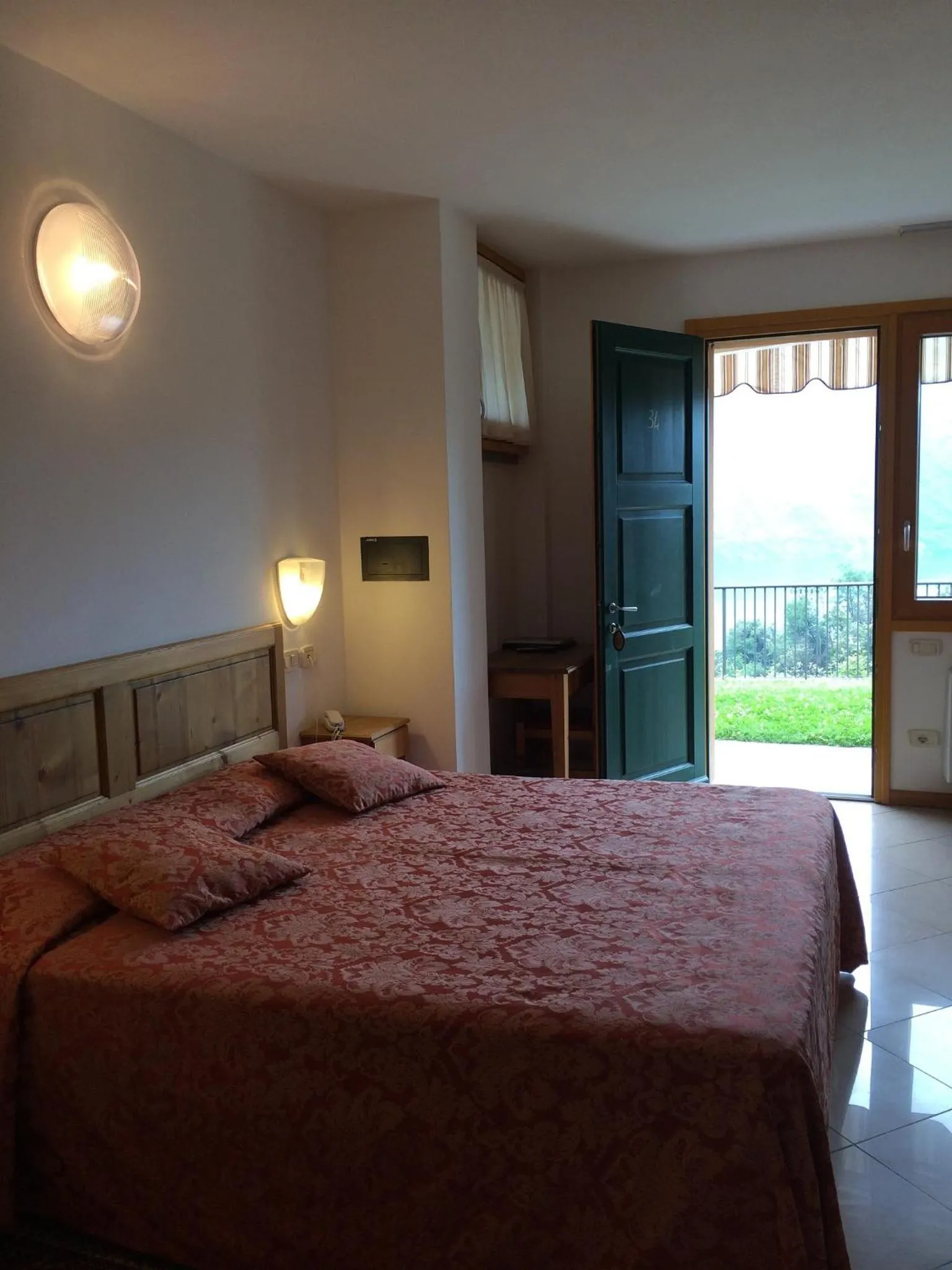 Photo of the whole room, Bed in Albergo Rusall