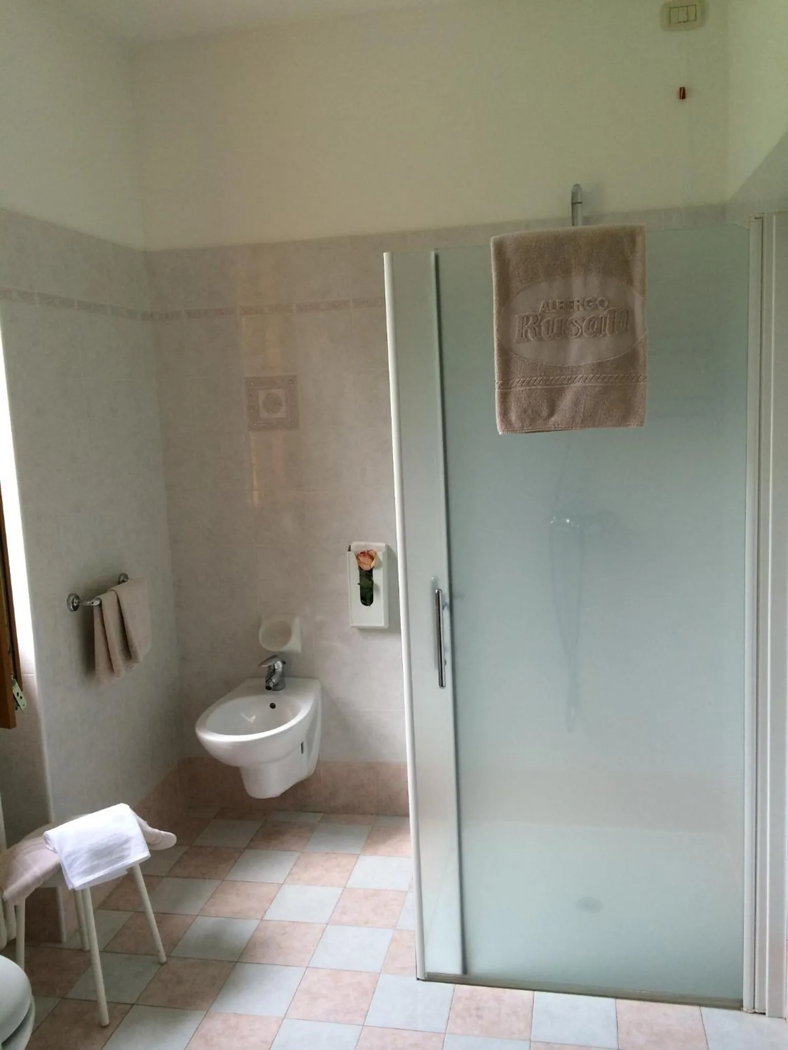 Bathroom in Albergo Rusall
