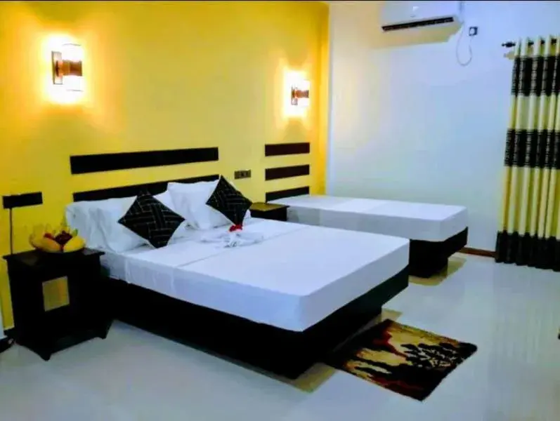 Deluxe Triple Room in AMRON RESORT SIGIRIYA Deluxe Triple Room in AMRON RESORT SIGIRIYA