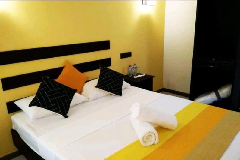 Bed in AMRON RESORT SIGIRIYA