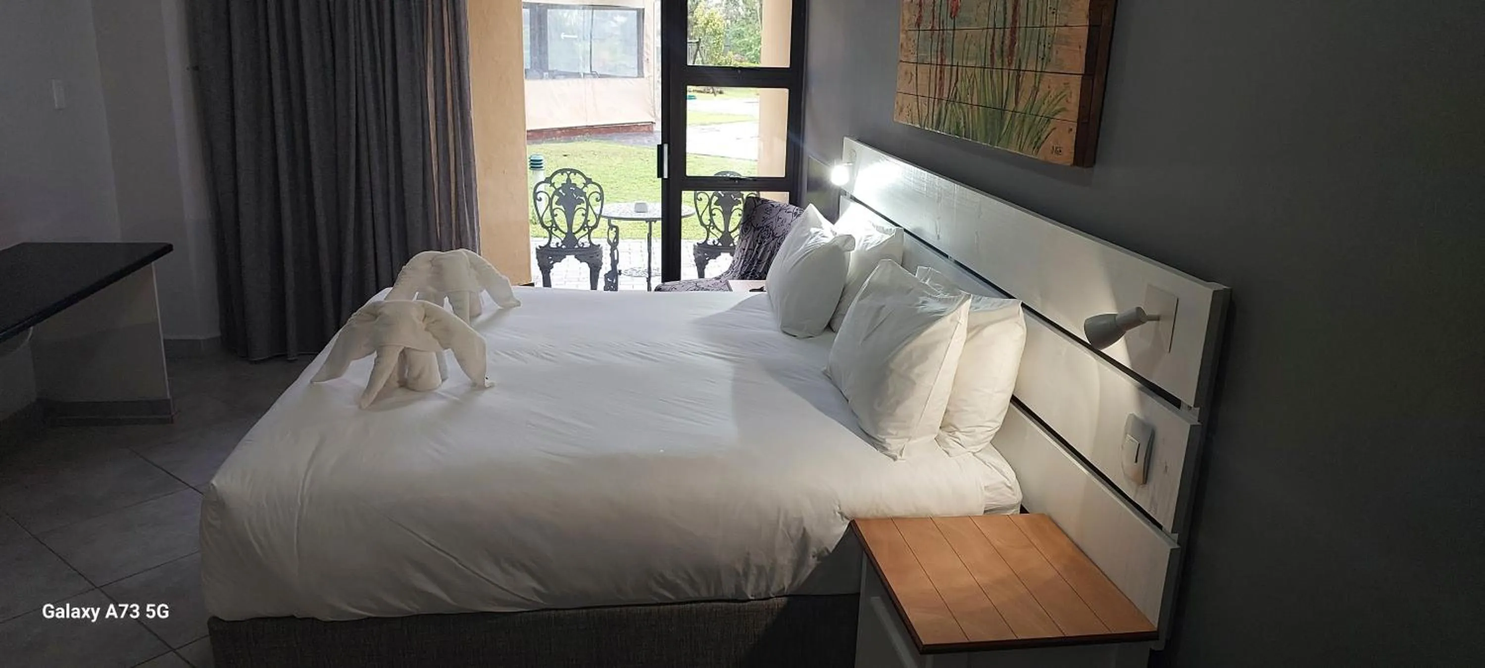 Bed in Elephant Lake Hotel