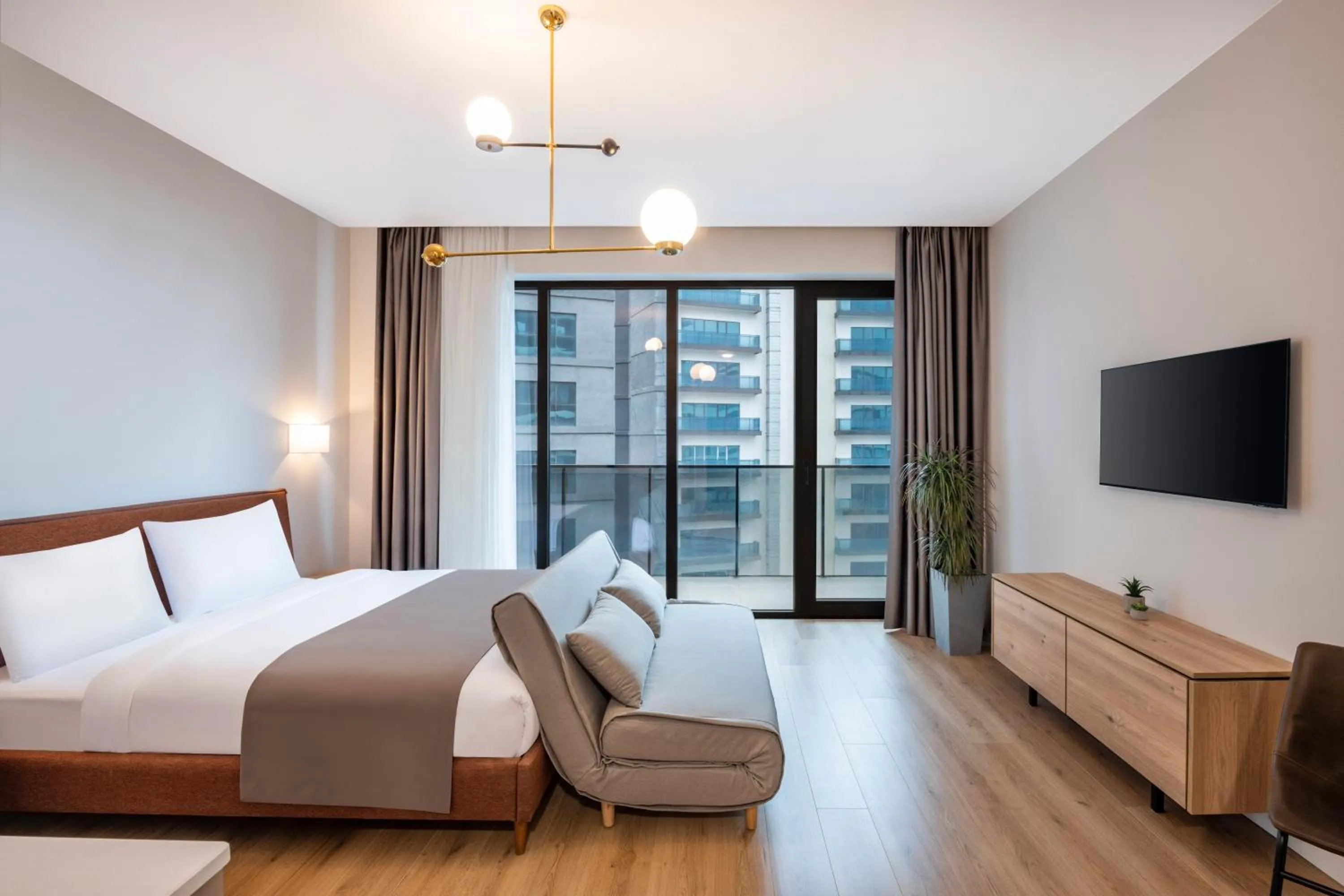 Living room, Bed in STEPS Batumi Hotel & Suites