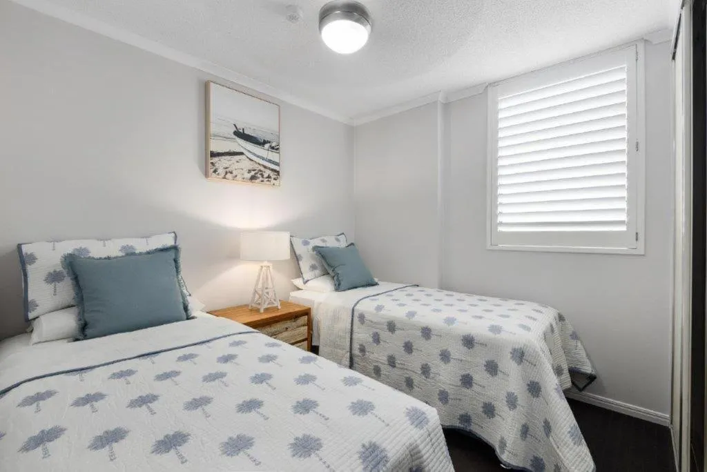 Bed in Maroochydore Riverfront Apartment