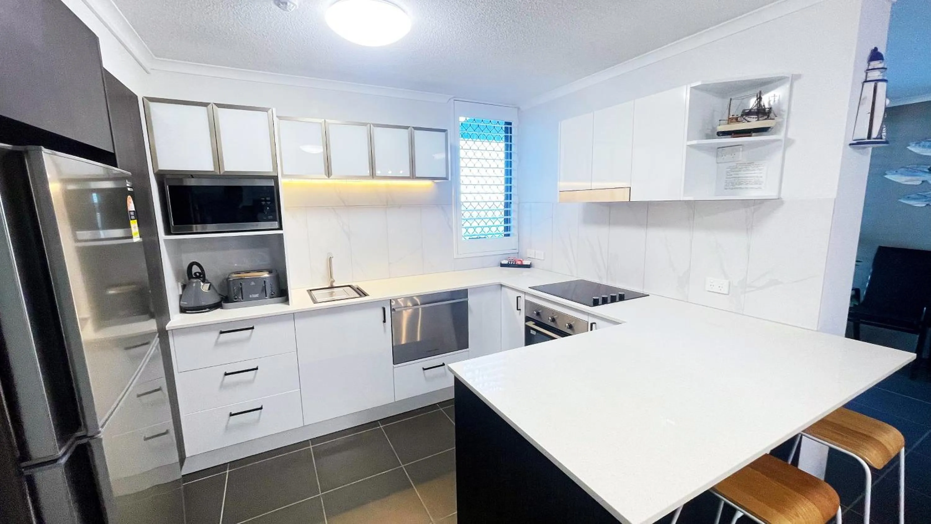 Kitchen or kitchenette in Maroochydore Riverfront Apartment