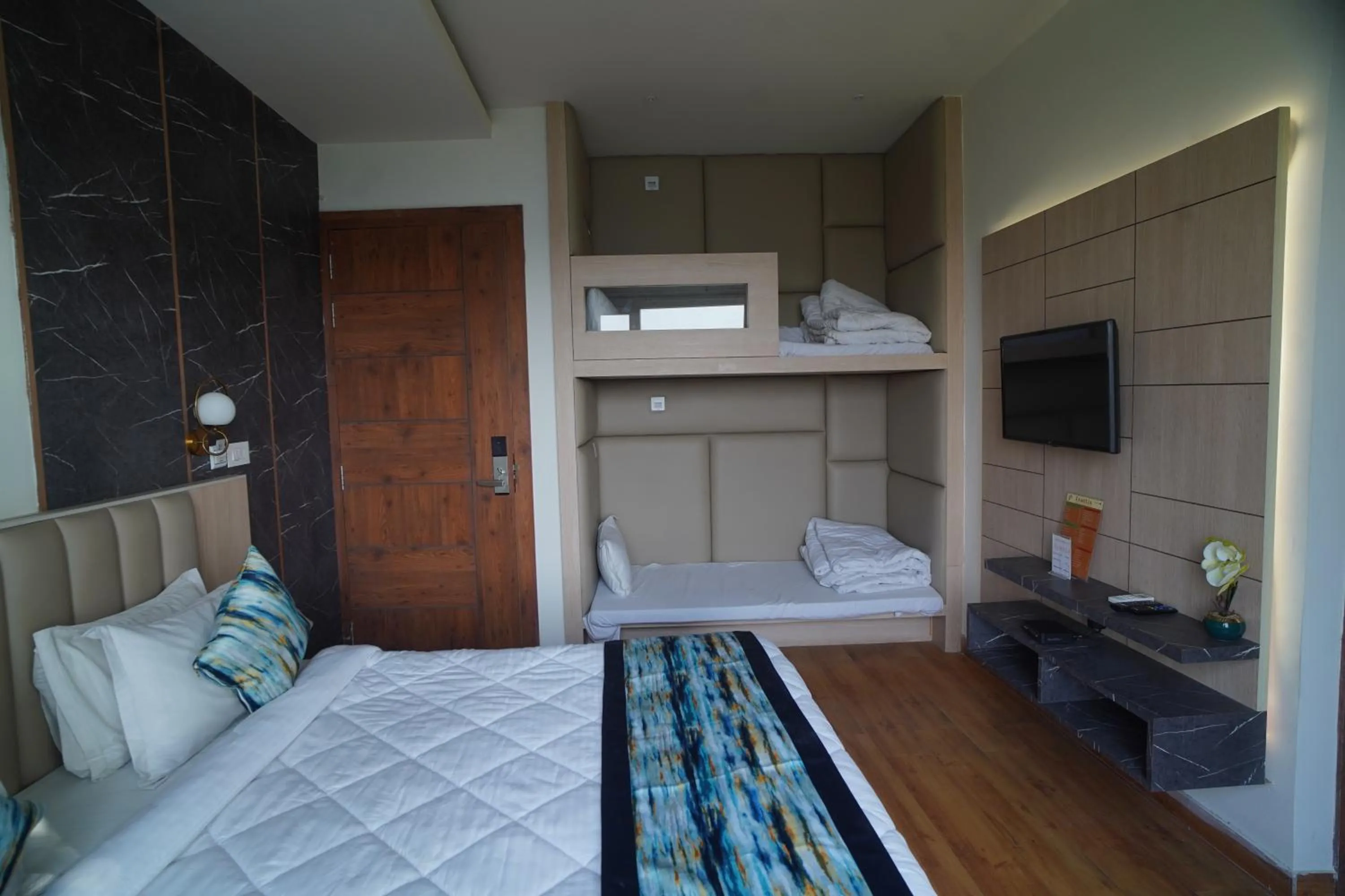 Bed in Familia Hotel and Banquets