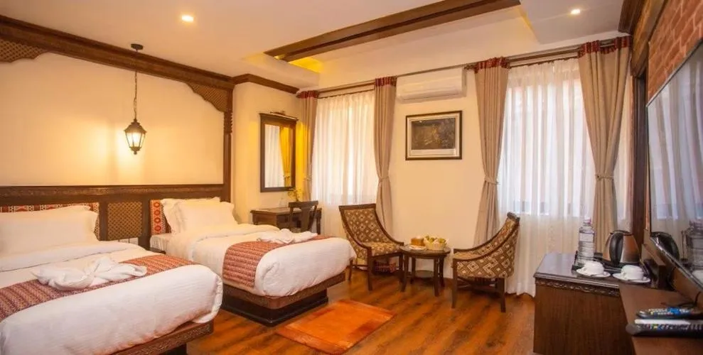 Bed in Pashupati Boutique Hotel & Spa