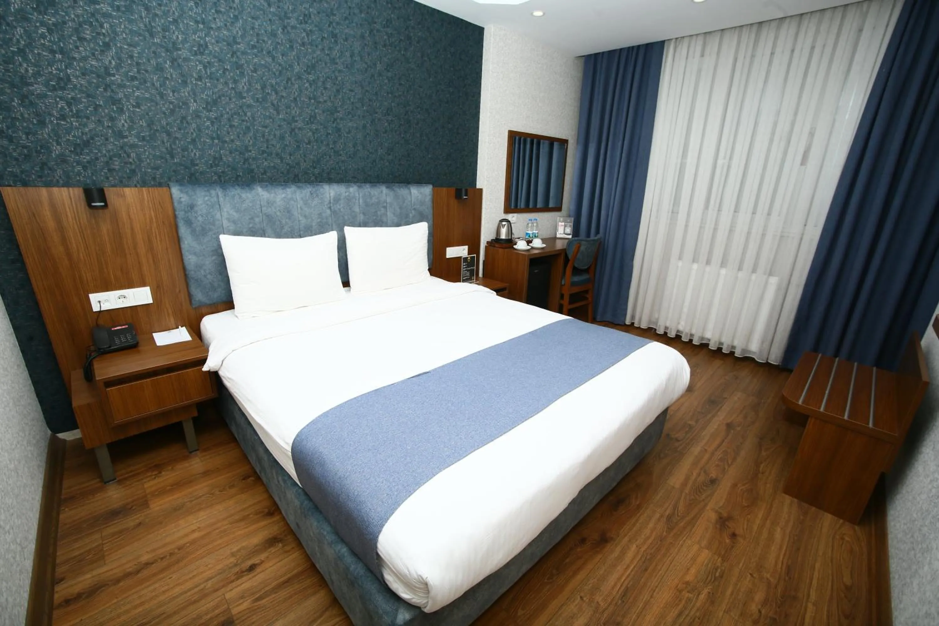 Bed in BUKAVİYYE HOTEL