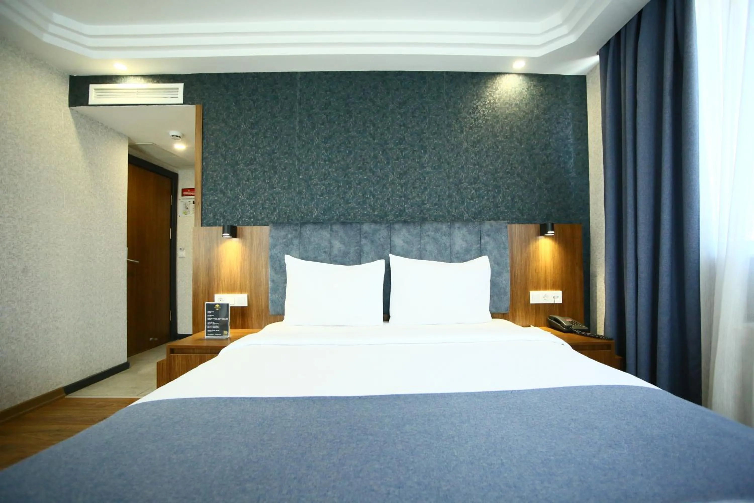 Bed in BUKAVİYYE HOTEL